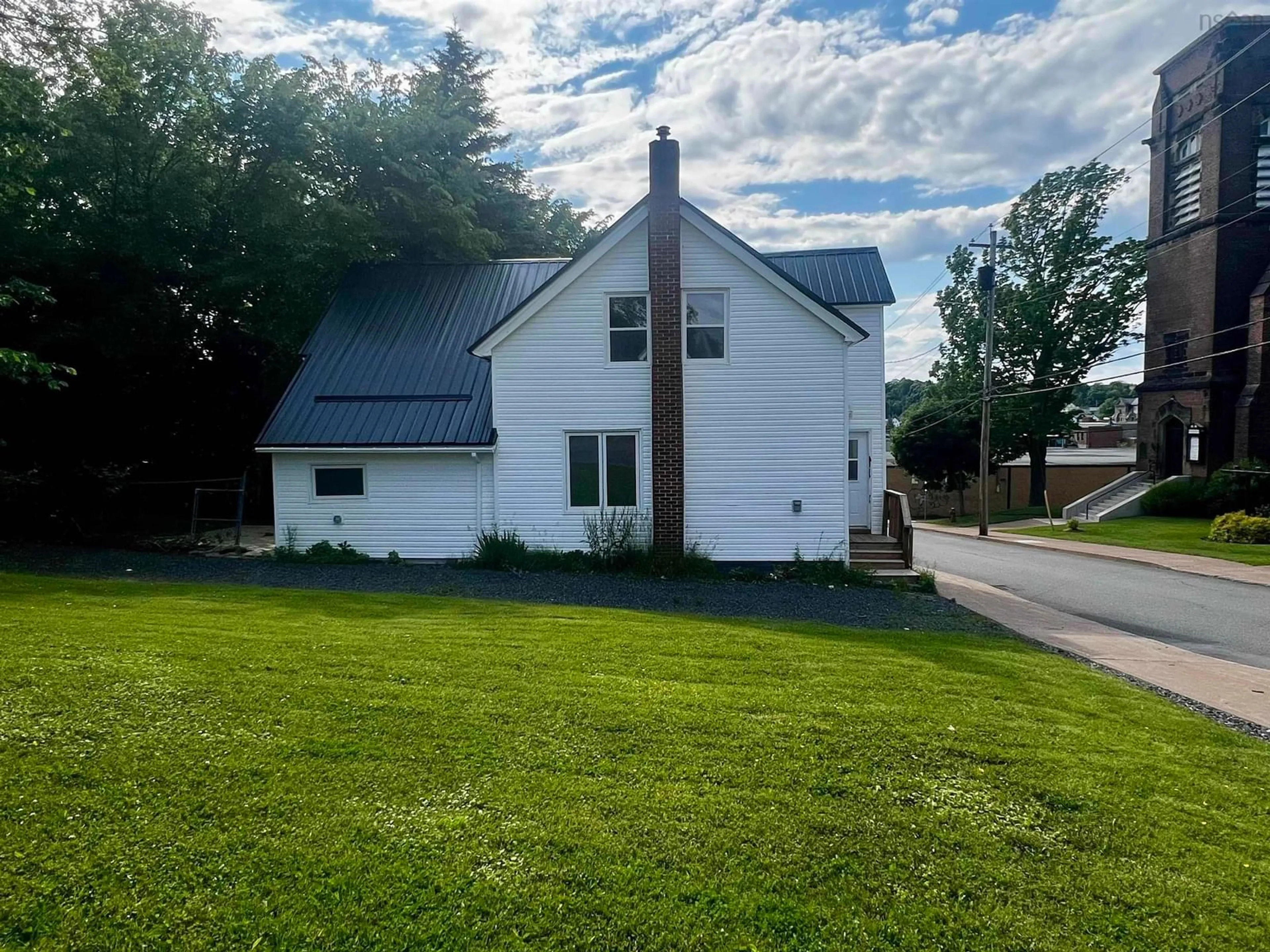 A pic from outside/outdoor area/front of a property/back of a property/a pic from drone, street for 221 Maclean St, New Glasgow Nova Scotia B2H 4M8