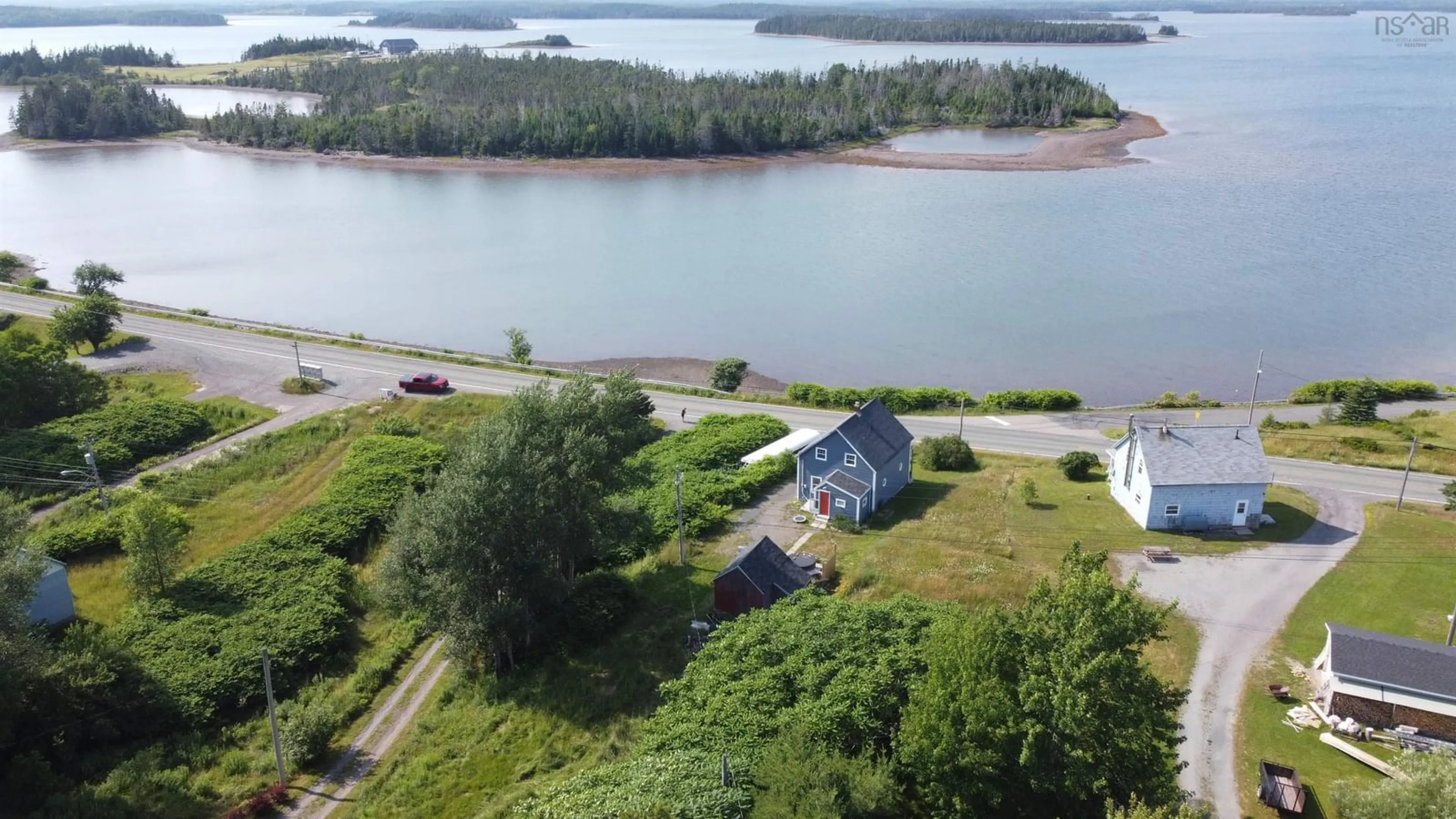 A pic from outside/outdoor area/front of a property/back of a property/a pic from drone, water/lake/river/ocean view for 2804 Highway 320, Poulamon Nova Scotia B0E 1K0