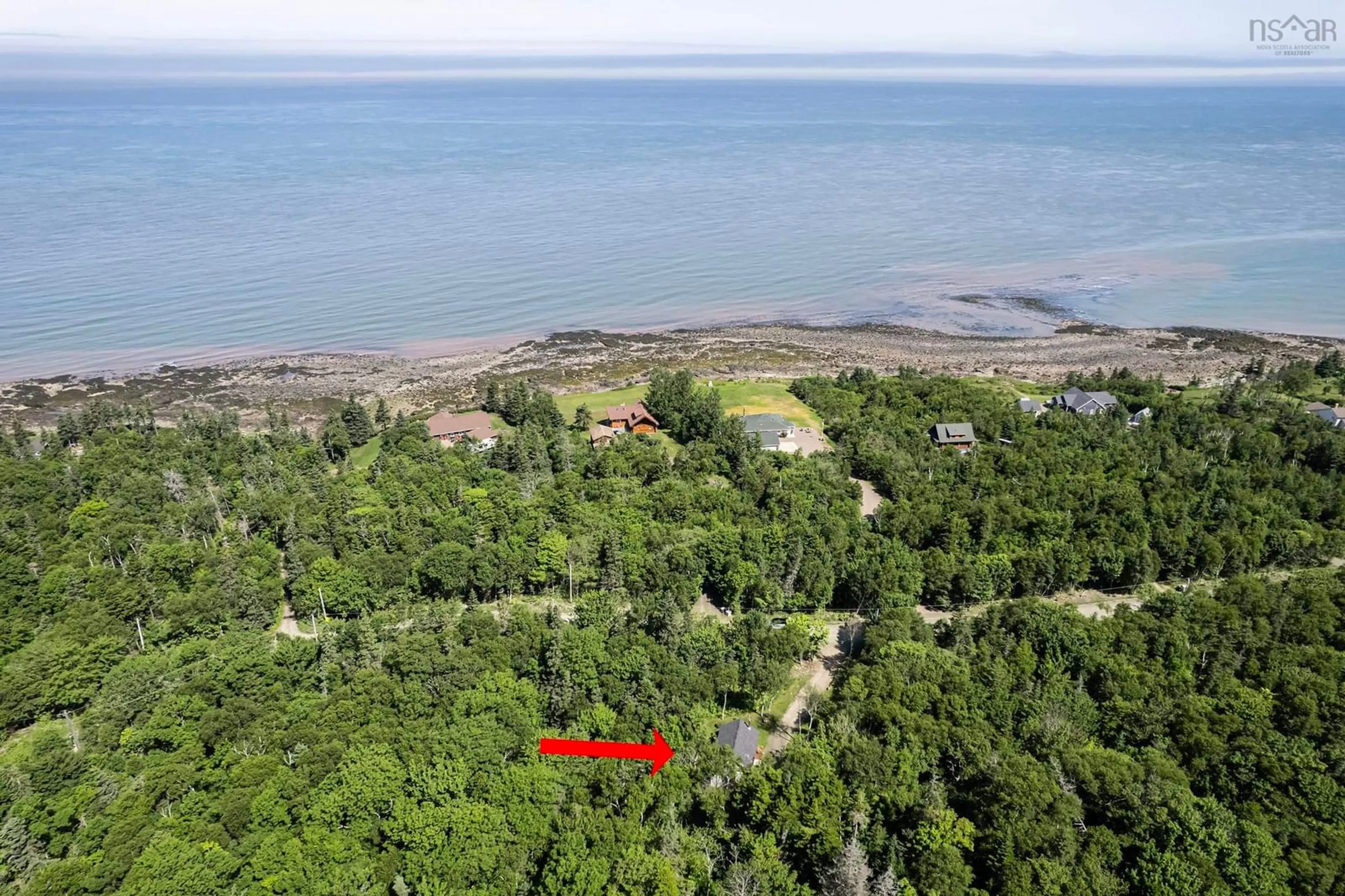A pic from outside/outdoor area/front of a property/back of a property/a pic from drone, water/lake/river/ocean view for 11484 Shore Rd, Mount Hanley Nova Scotia B0S 1P0