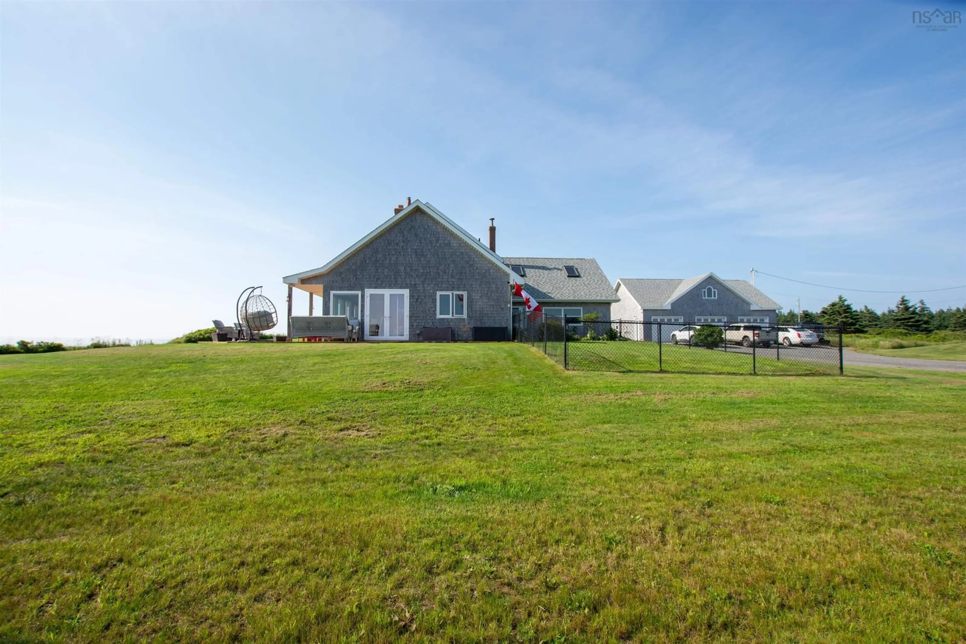 A pic from outside/outdoor area/front of a property/back of a property/a pic from drone, unknown for 2435 Main Shore Rd, Port Maitland Nova Scotia B5A 5V1