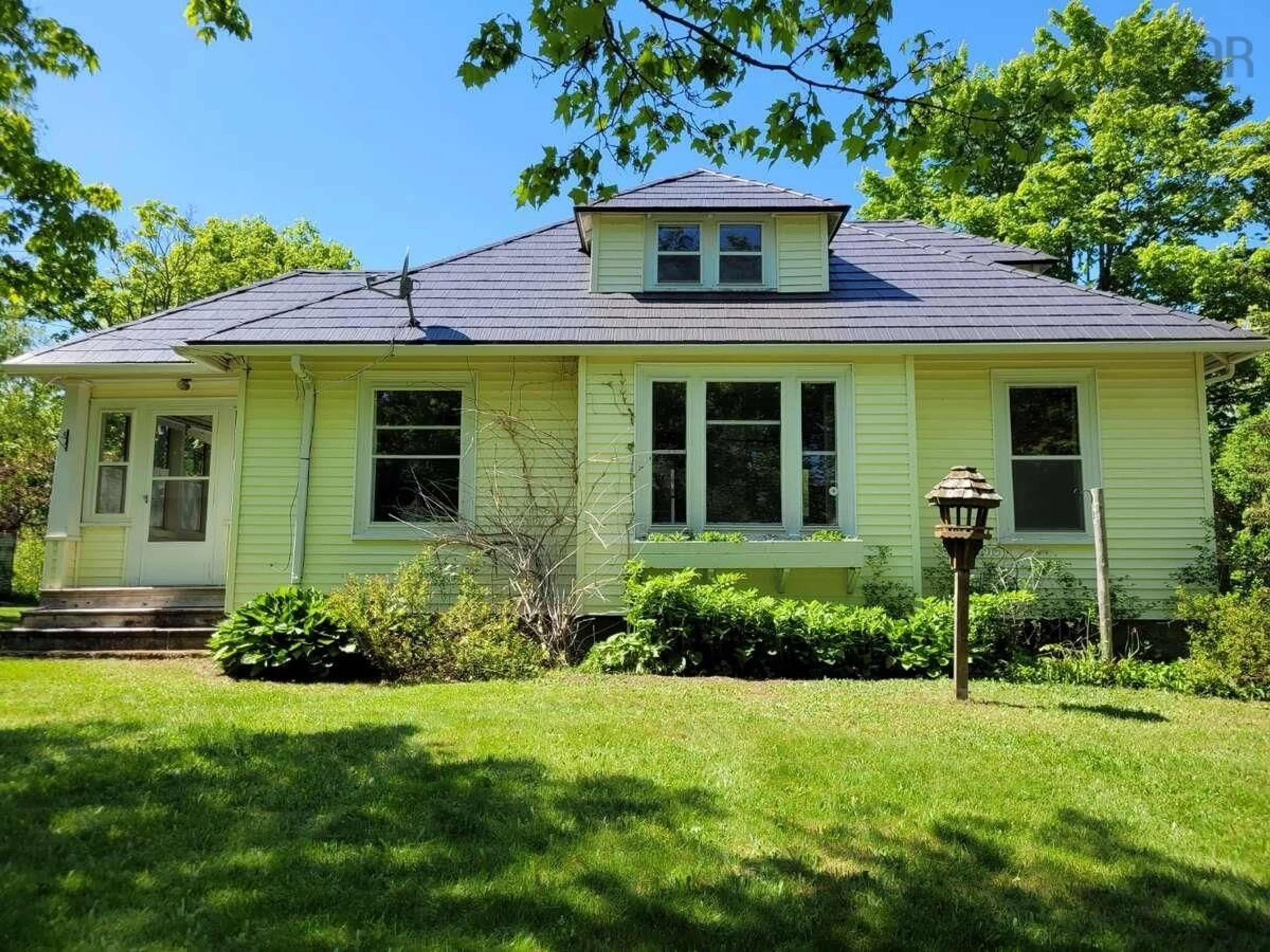 Home with vinyl exterior material, street for 2515 Evangeline Trail, Aylesford Nova Scotia B0P 1C0