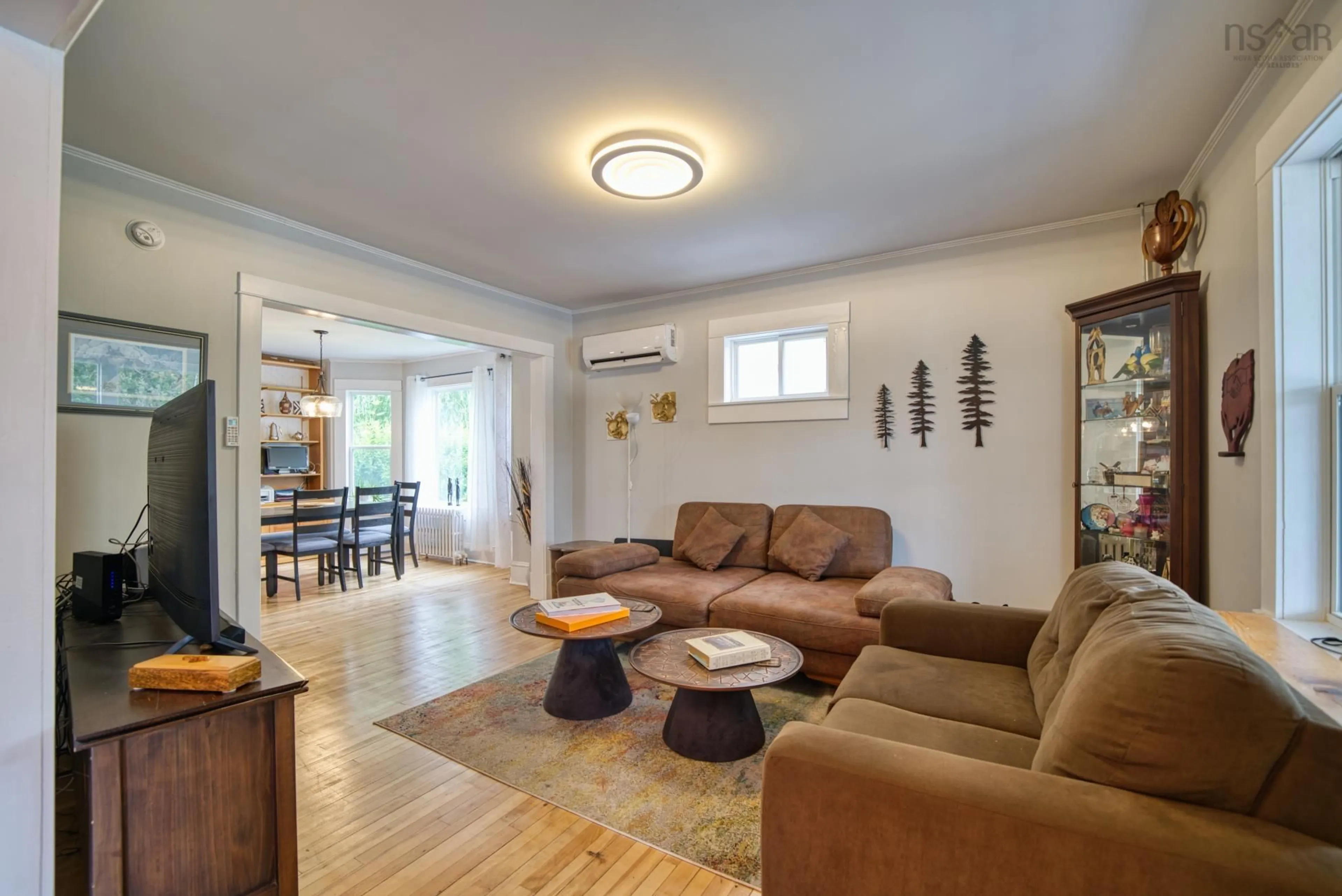 Living room with furniture, wood/laminate floor for 185 King St, Bridgewater Nova Scotia B4V 1A5