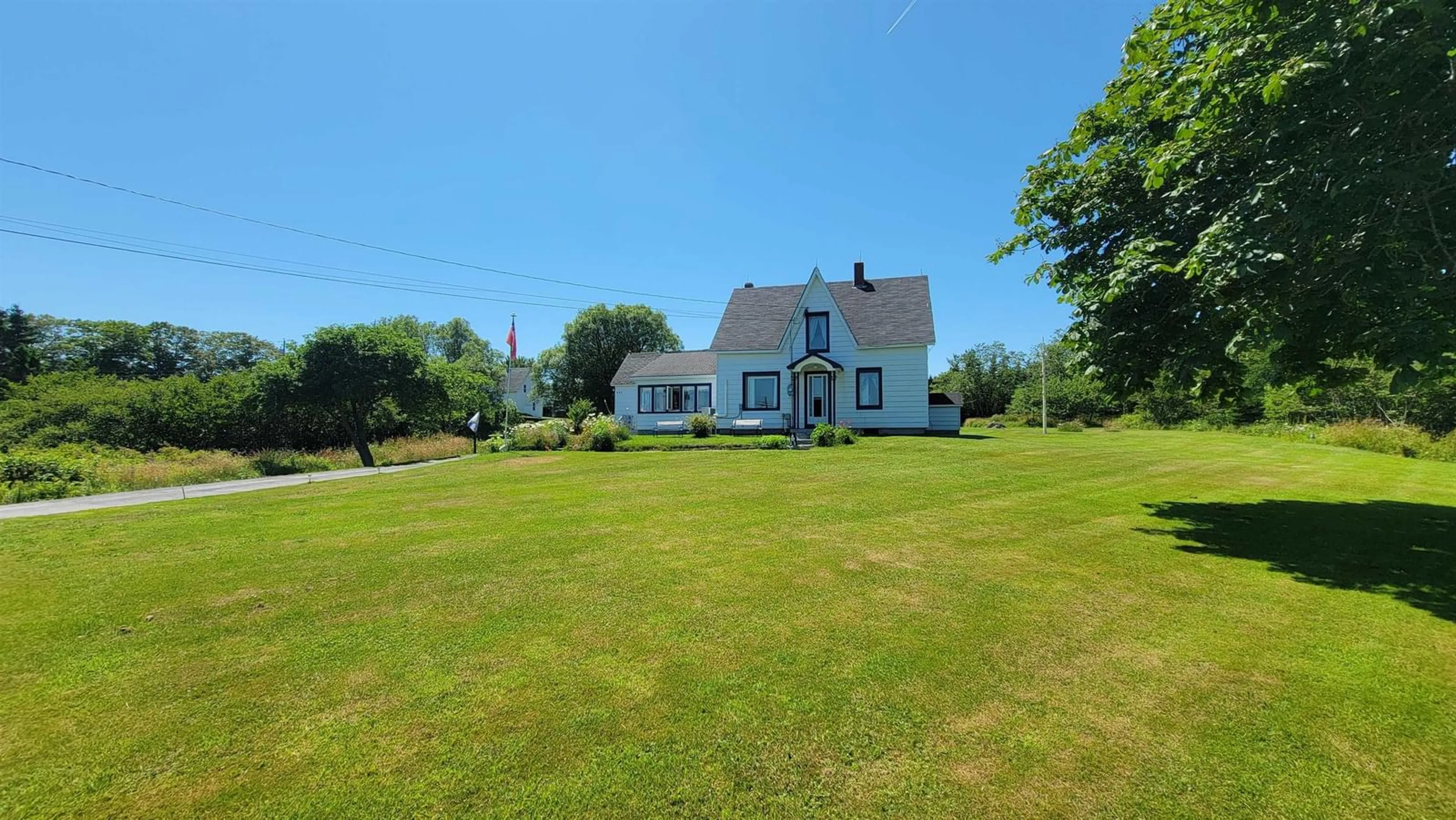 A pic from outside/outdoor area/front of a property/back of a property/a pic from drone, unknown for 486 335 Hwy, West Pubnico Nova Scotia B0W 3S0