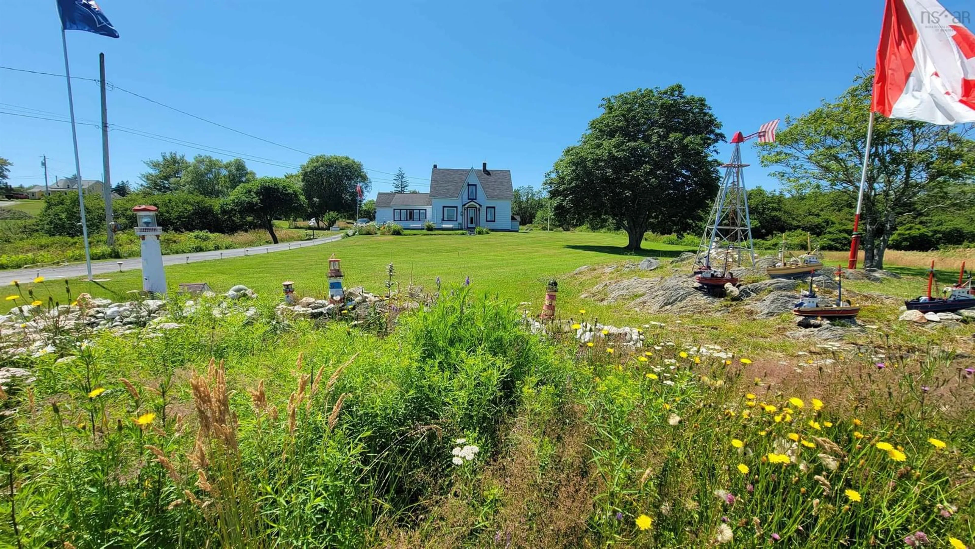 A pic from outside/outdoor area/front of a property/back of a property/a pic from drone, building for 486 335 Hwy, West Pubnico Nova Scotia B0W 3S0