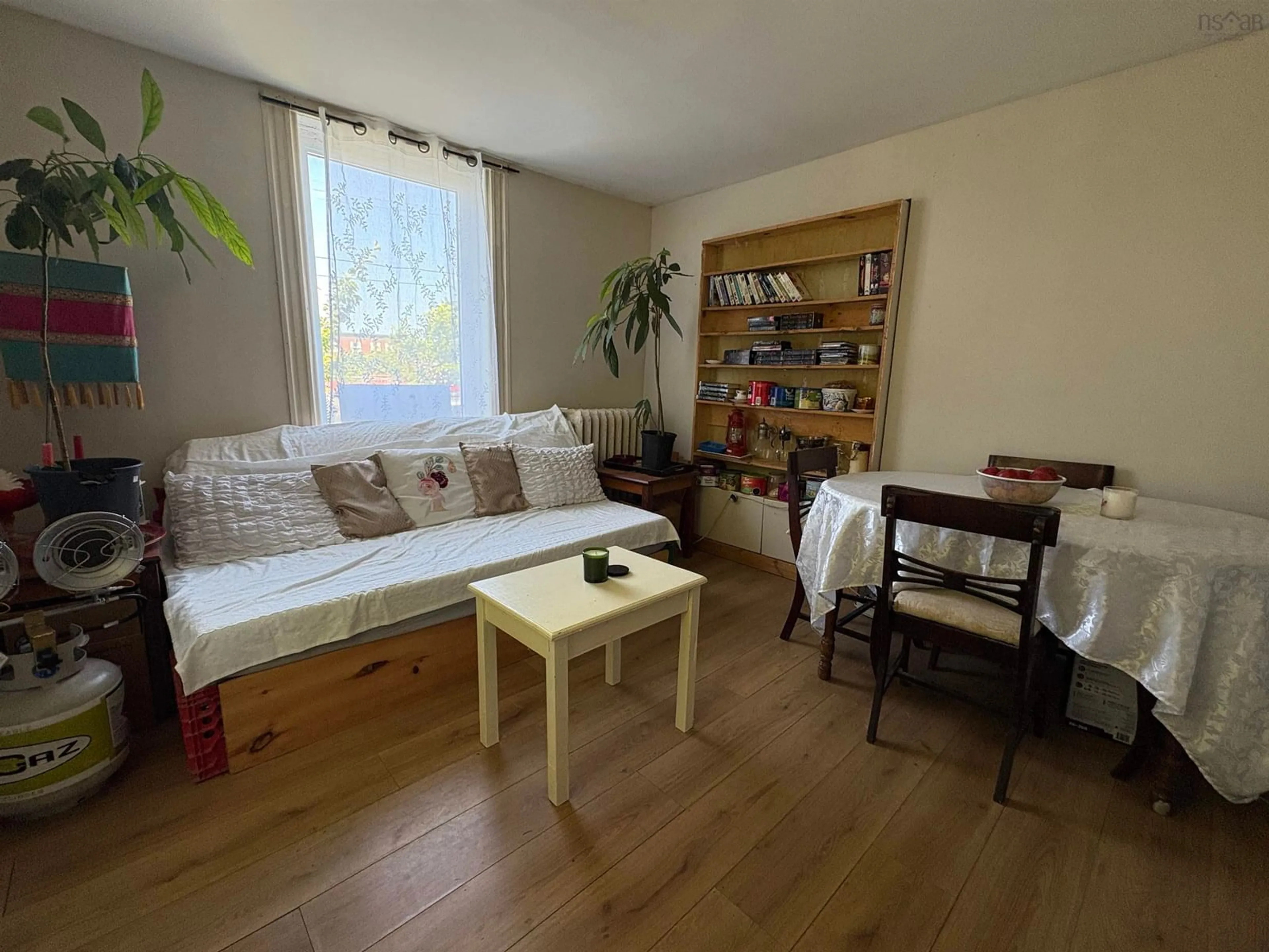 Living room with furniture, wood/laminate floor for 236 James St, New Glasgow Nova Scotia B2H 2Z1