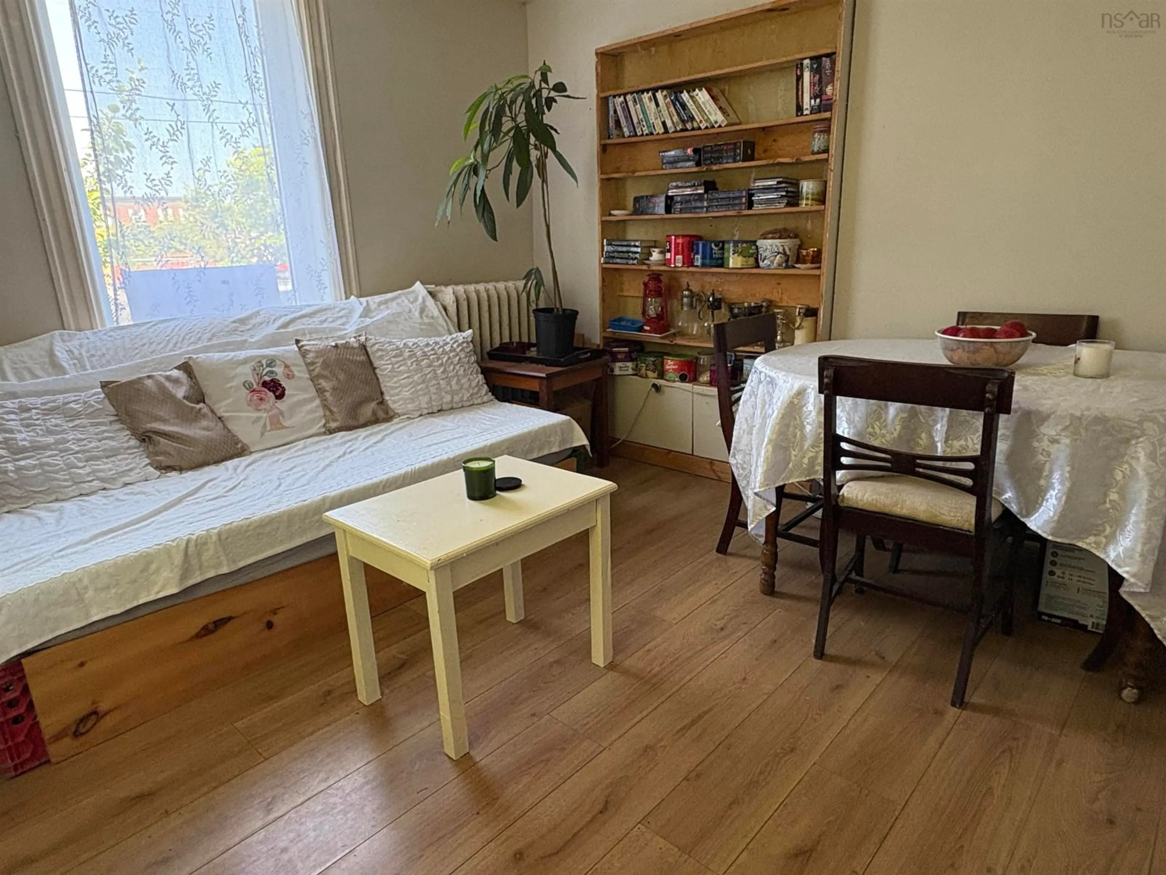 Living room with furniture, wood/laminate floor for 236 James St, New Glasgow Nova Scotia B2H 2Z1