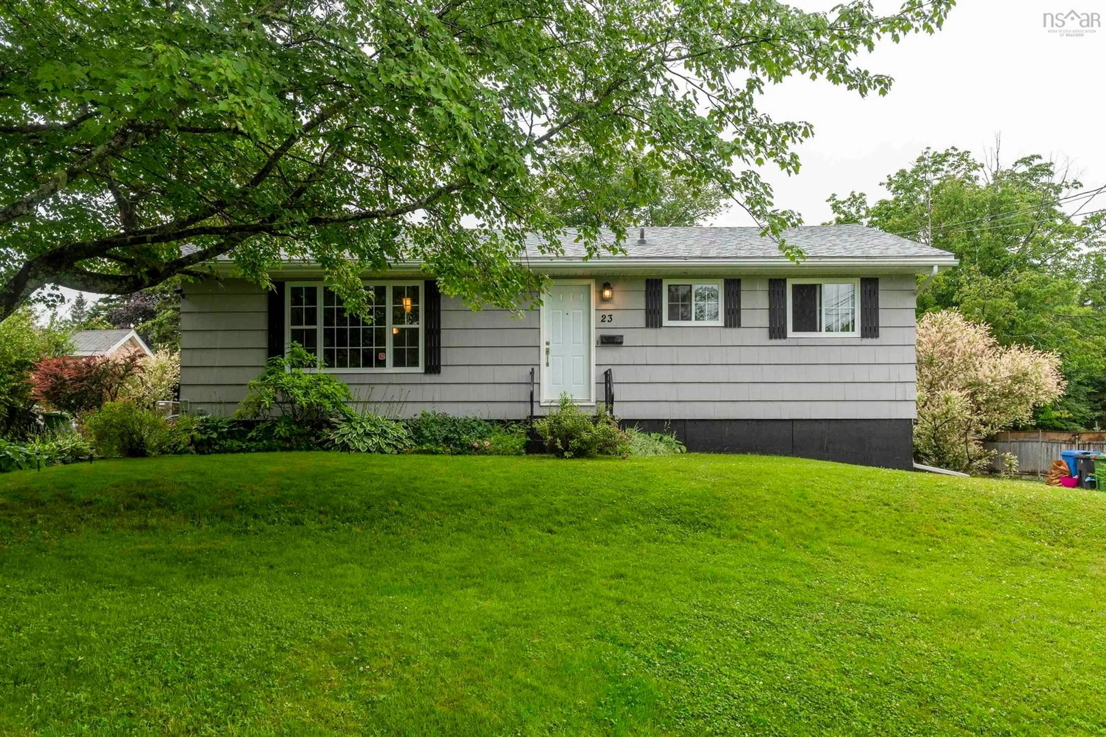 Home with vinyl exterior material, street for 23 Odell Dr, Cole Harbour Nova Scotia B2W 3T3