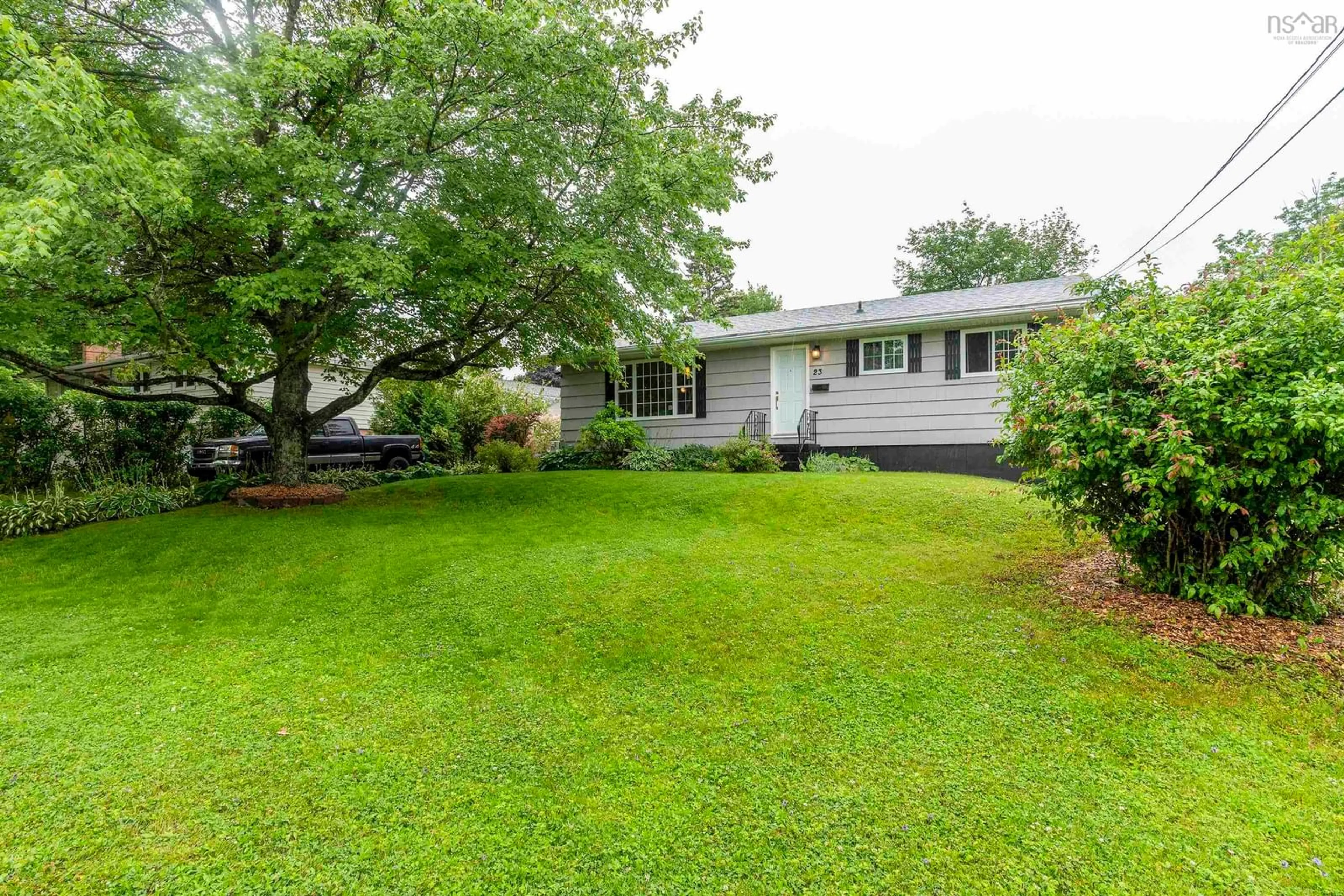 Home with vinyl exterior material, street for 23 Odell Dr, Cole Harbour Nova Scotia B2W 3T3