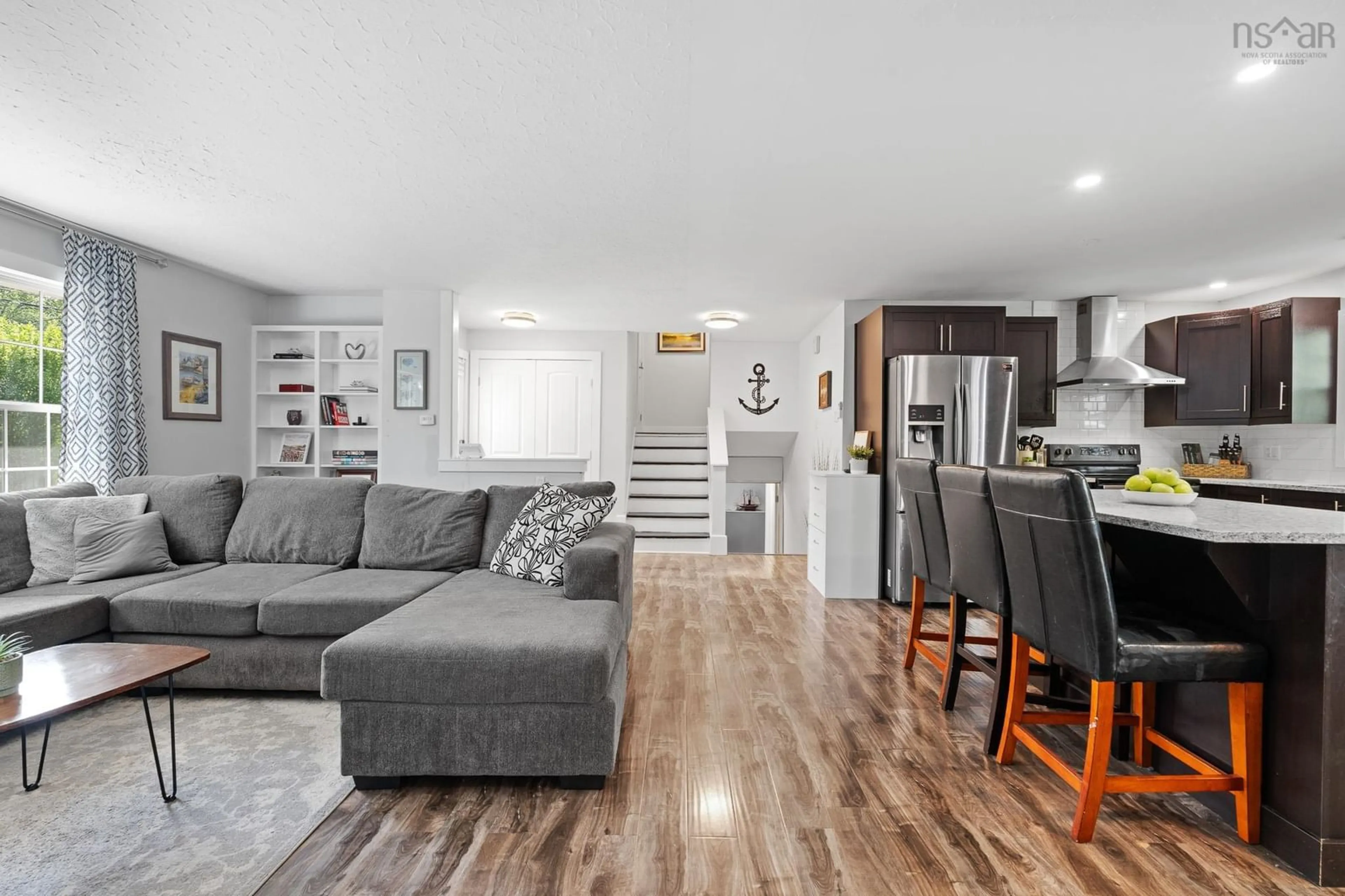 Open concept kitchen, wood/laminate floor for 19 Ridge Ave, Lower Sackville Nova Scotia B4C 2L5