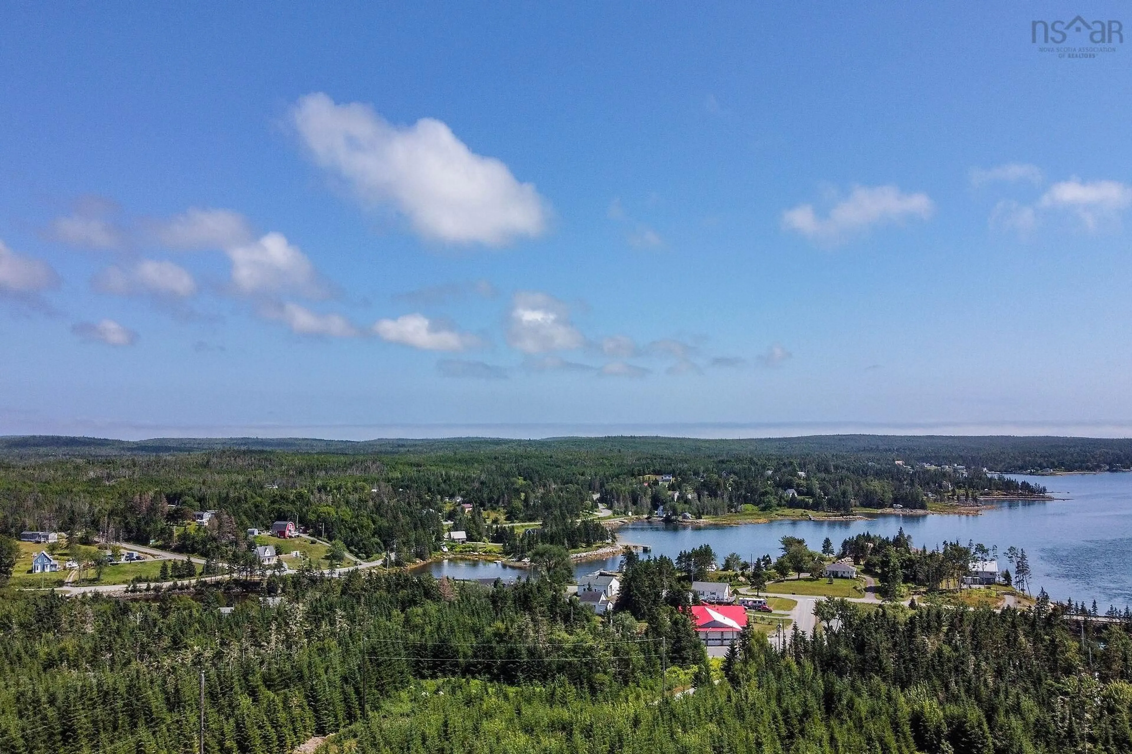 A pic from outside/outdoor area/front of a property/back of a property/a pic from drone, water/lake/river/ocean view for 54 Old Trunk Rd, Oyster Pond Nova Scotia B0J 2L0