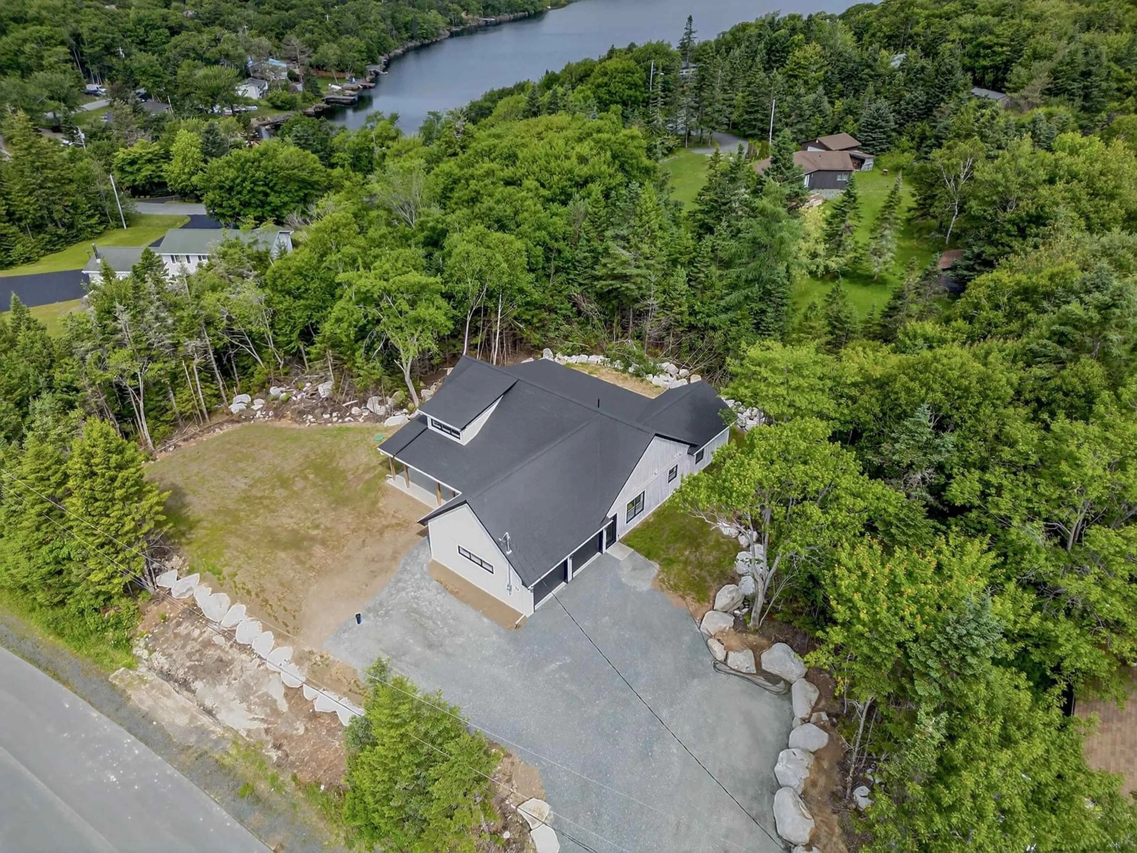 A pic from outside/outdoor area/front of a property/back of a property/a pic from drone, water/lake/river/ocean view for 24 Shannon Rd, Brookside Nova Scotia B3T 1T9