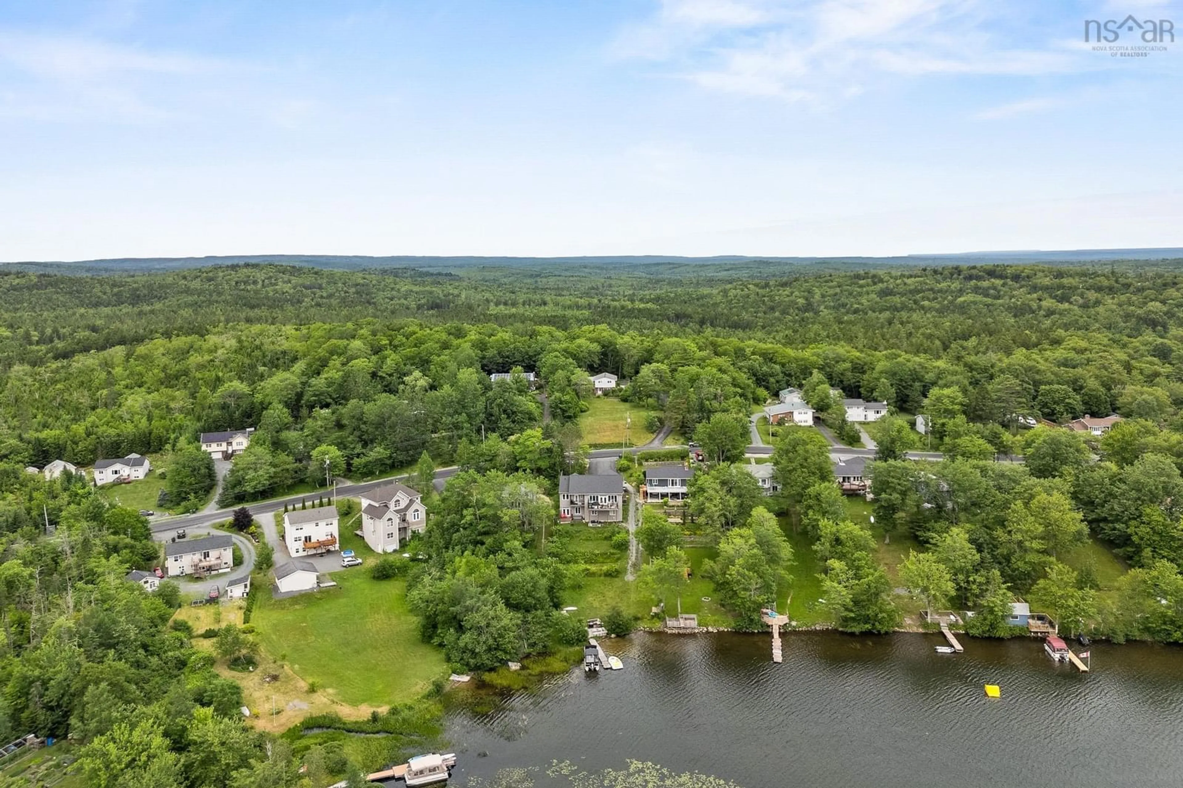 A pic from outside/outdoor area/front of a property/back of a property/a pic from drone, water/lake/river/ocean view for 576 Lakeview Ave, Middle Sackville Nova Scotia B4E 3B8