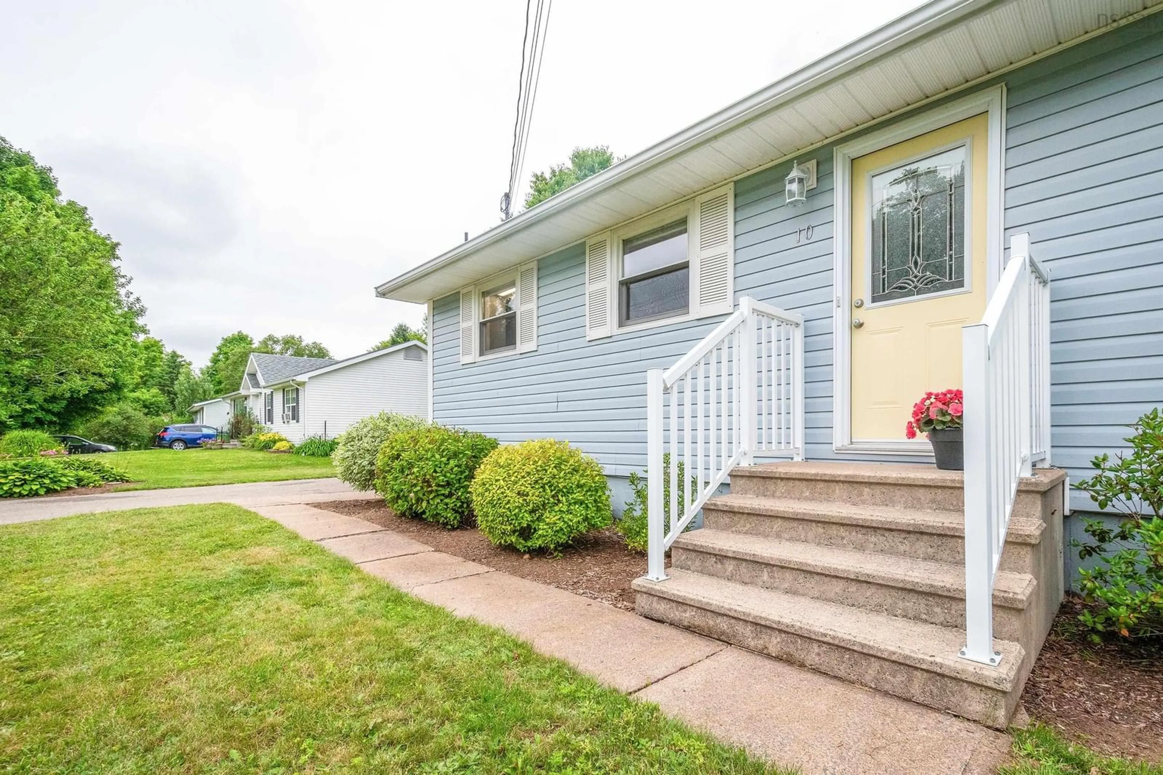 Home with vinyl exterior material, street for 10 Bezanson Dr, Berwick Nova Scotia B0P 1E0