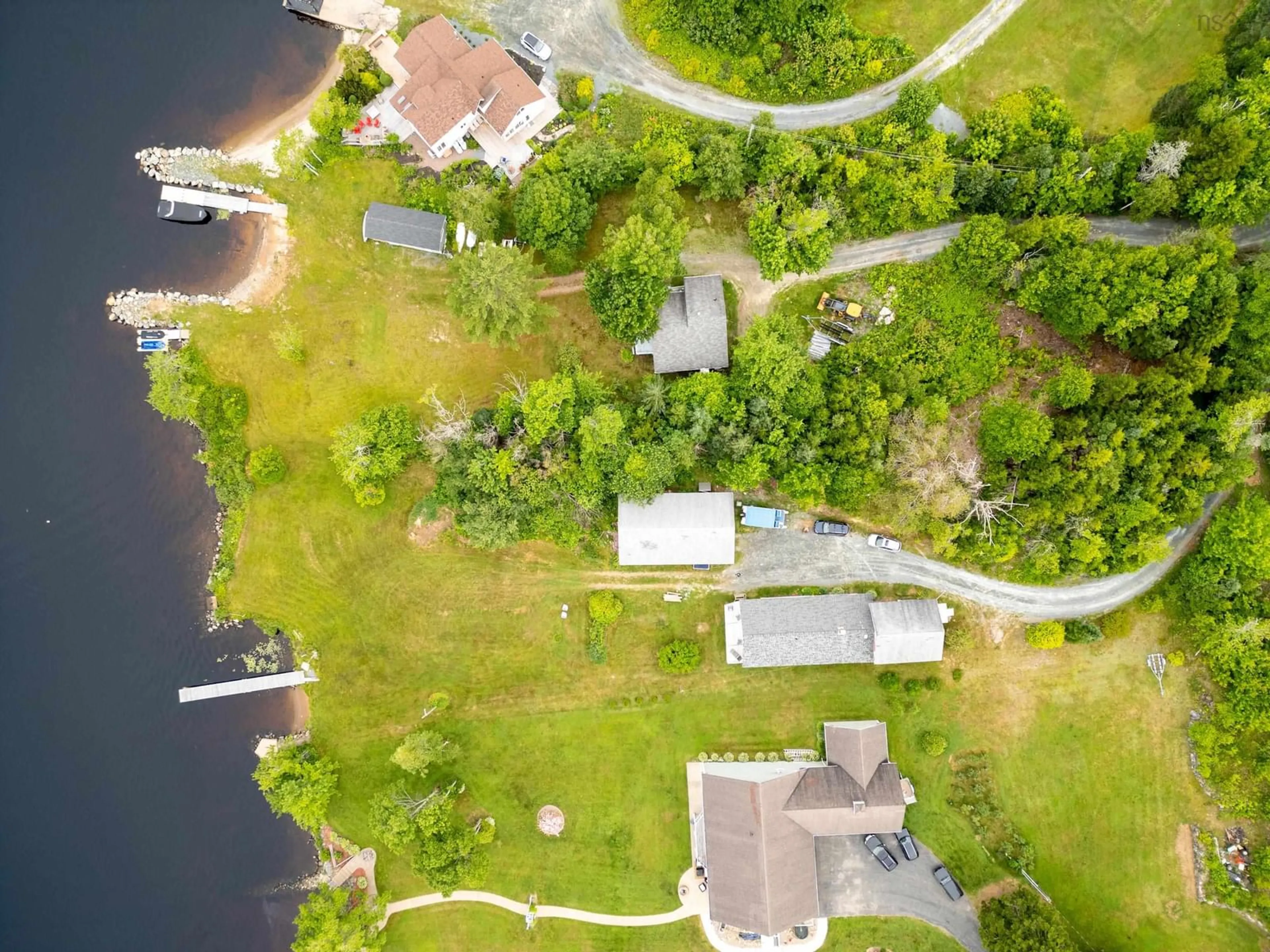 A pic from outside/outdoor area/front of a property/back of a property/a pic from drone, water/lake/river/ocean view for 130 Whisper Ridge, Porters Lake Nova Scotia B3E 1J6