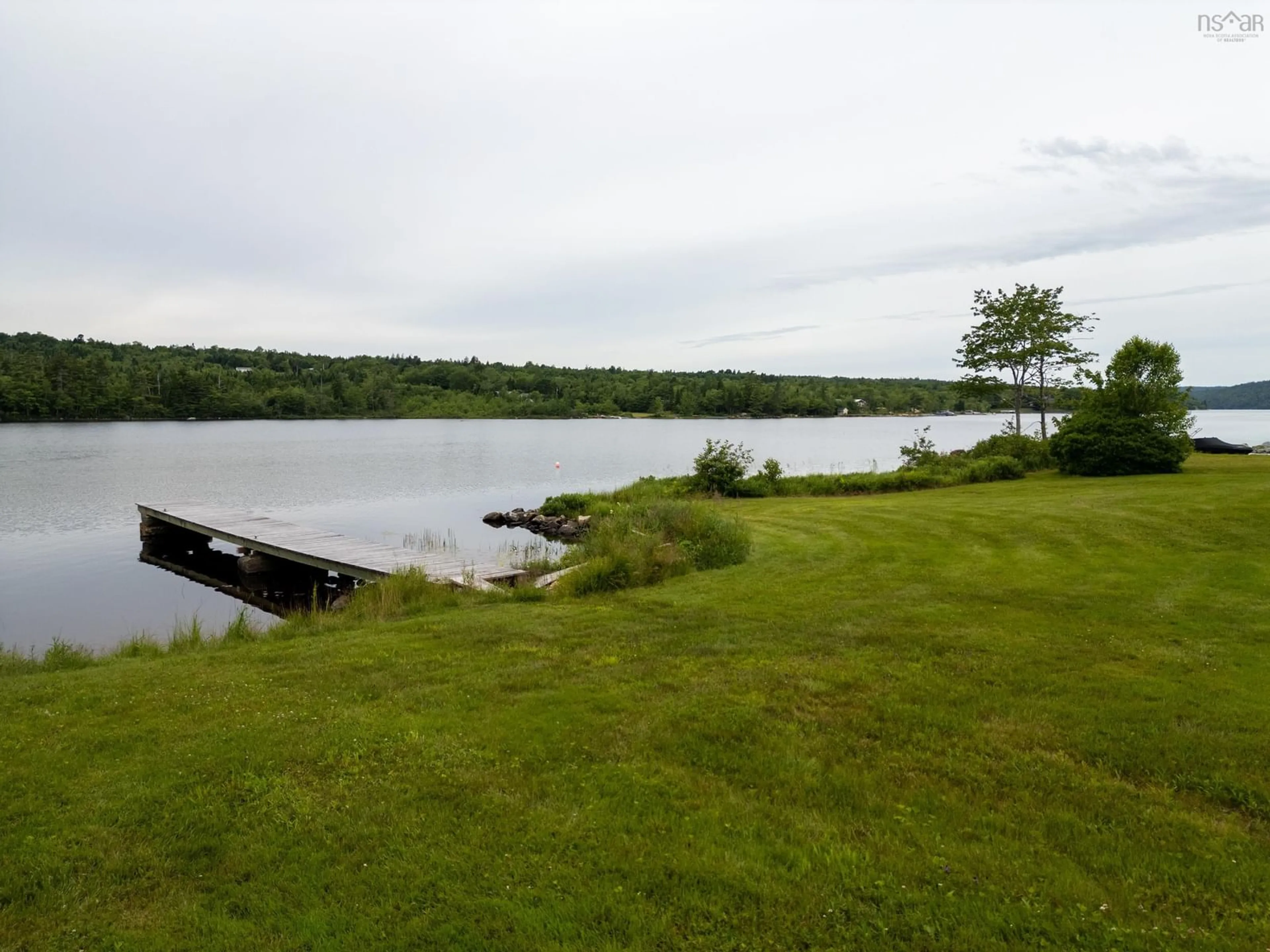 A pic from outside/outdoor area/front of a property/back of a property/a pic from drone, water/lake/river/ocean view for 130 Whisper Ridge, Porters Lake Nova Scotia B3E 1J6