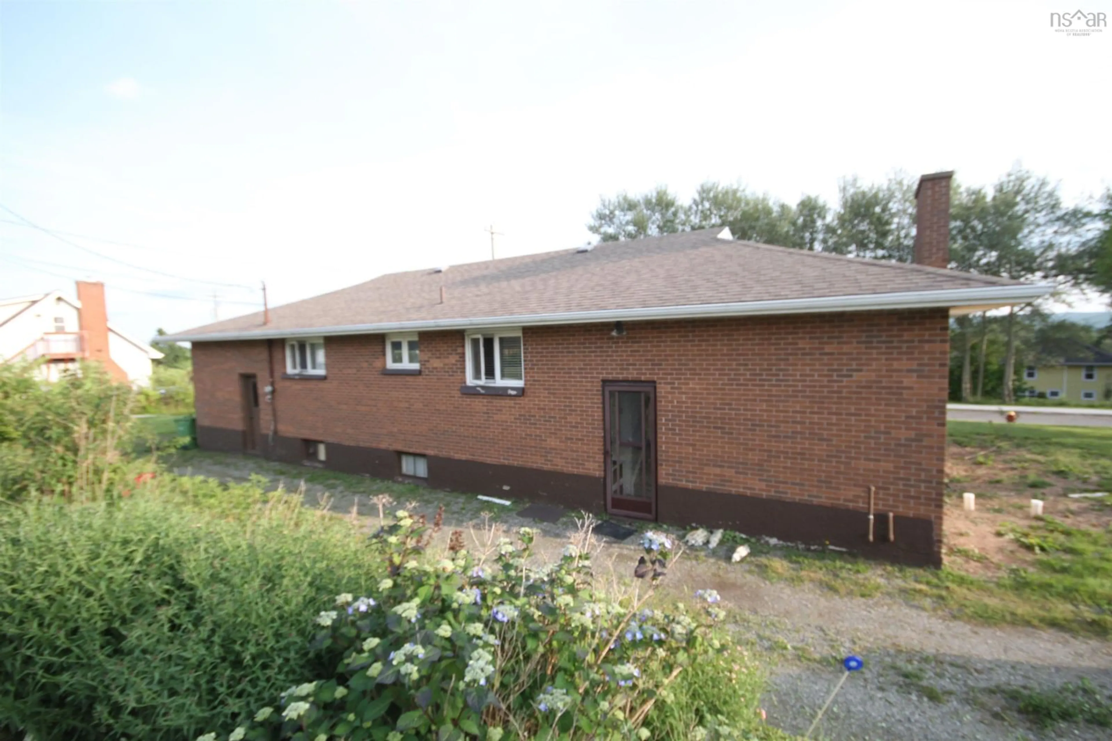A pic from outside/outdoor area/front of a property/back of a property/a pic from drone, building for 504 Queen St, Port Hawkesbury Nova Scotia B9A 2V9