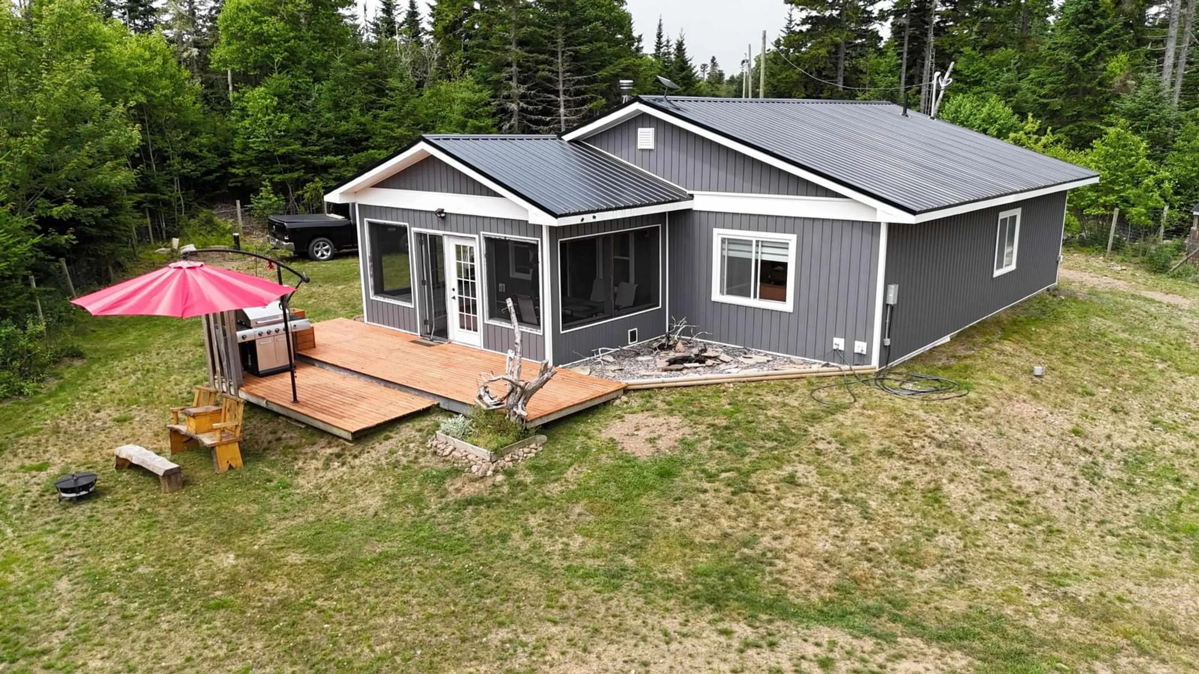 A pic from outside/outdoor area/front of a property/back of a property/a pic from drone, unknown for 498 Fox Point Rd, Fox River Nova Scotia B0M 1S0