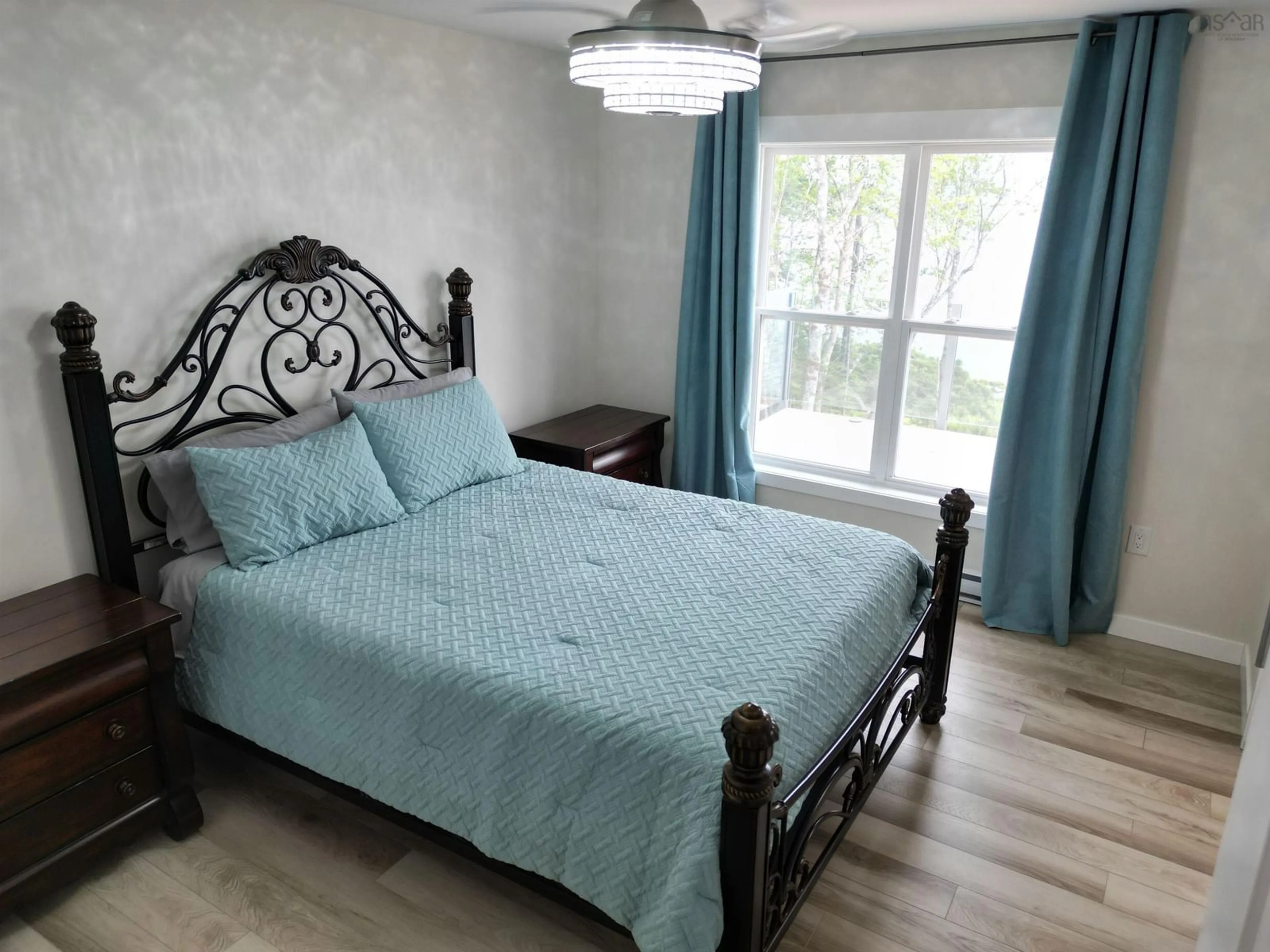 Bedroom with bed, wood/laminate floor for 259 Maple Dr, Cape George Nova Scotia B0E 3B0