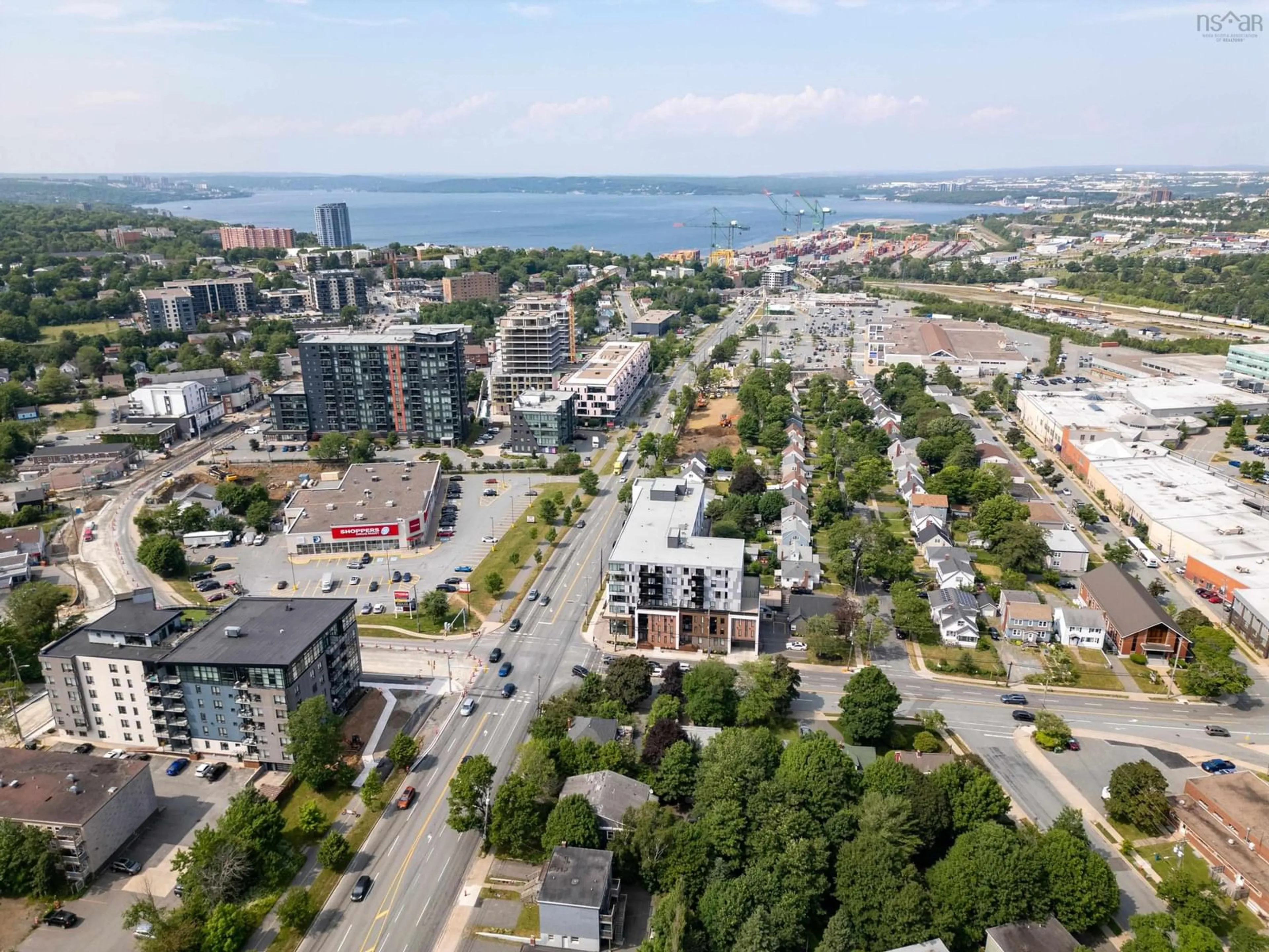 A pic from outside/outdoor area/front of a property/back of a property/a pic from drone, city buildings view from balcony for 7132 Spruce St, Halifax Nova Scotia B3L 2M5