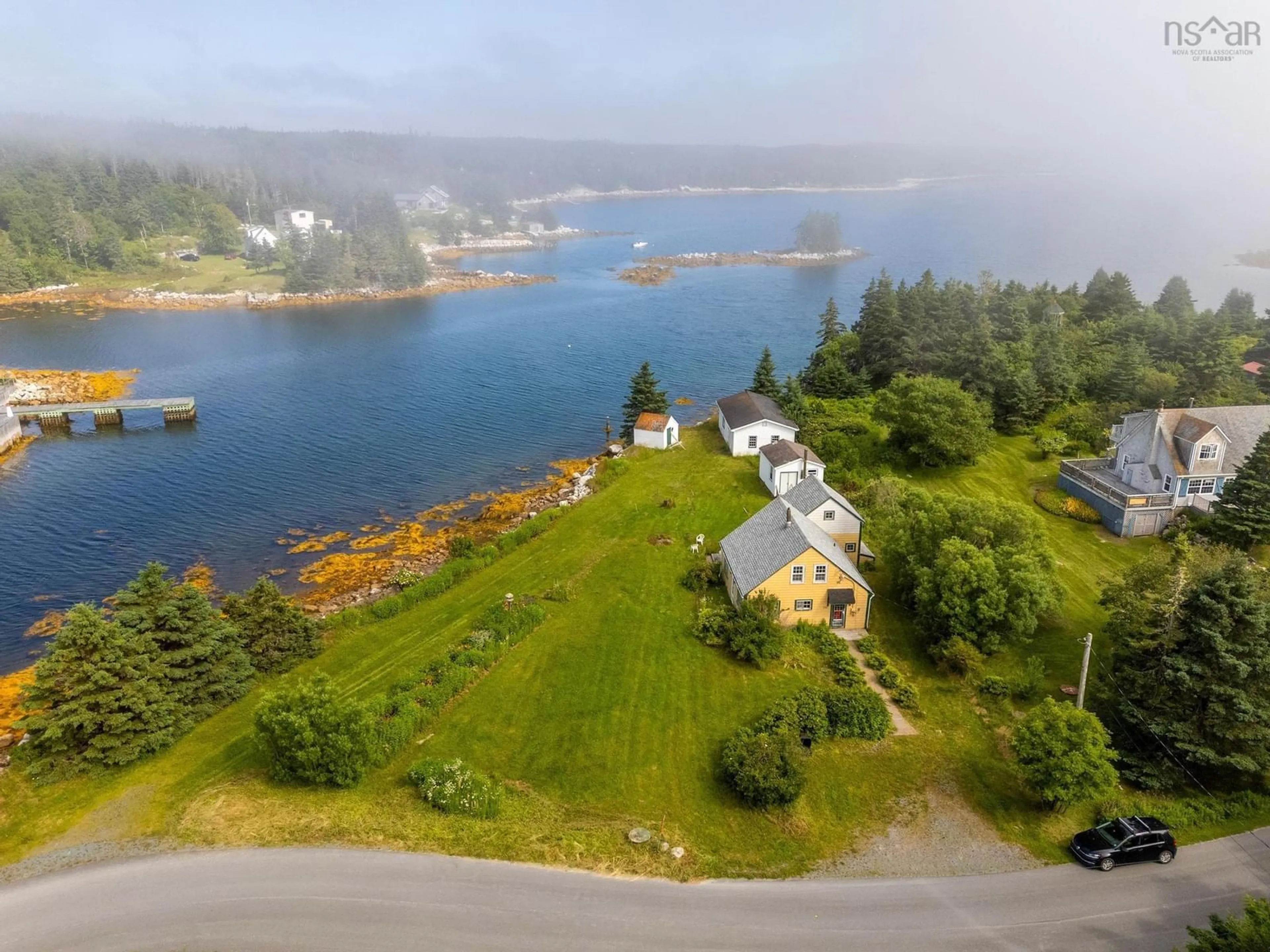 A pic from outside/outdoor area/front of a property/back of a property/a pic from drone, water/lake/river/ocean view for 194 Paddy's Head Road, Indian Harbour Nova Scotia B3Z 3N8