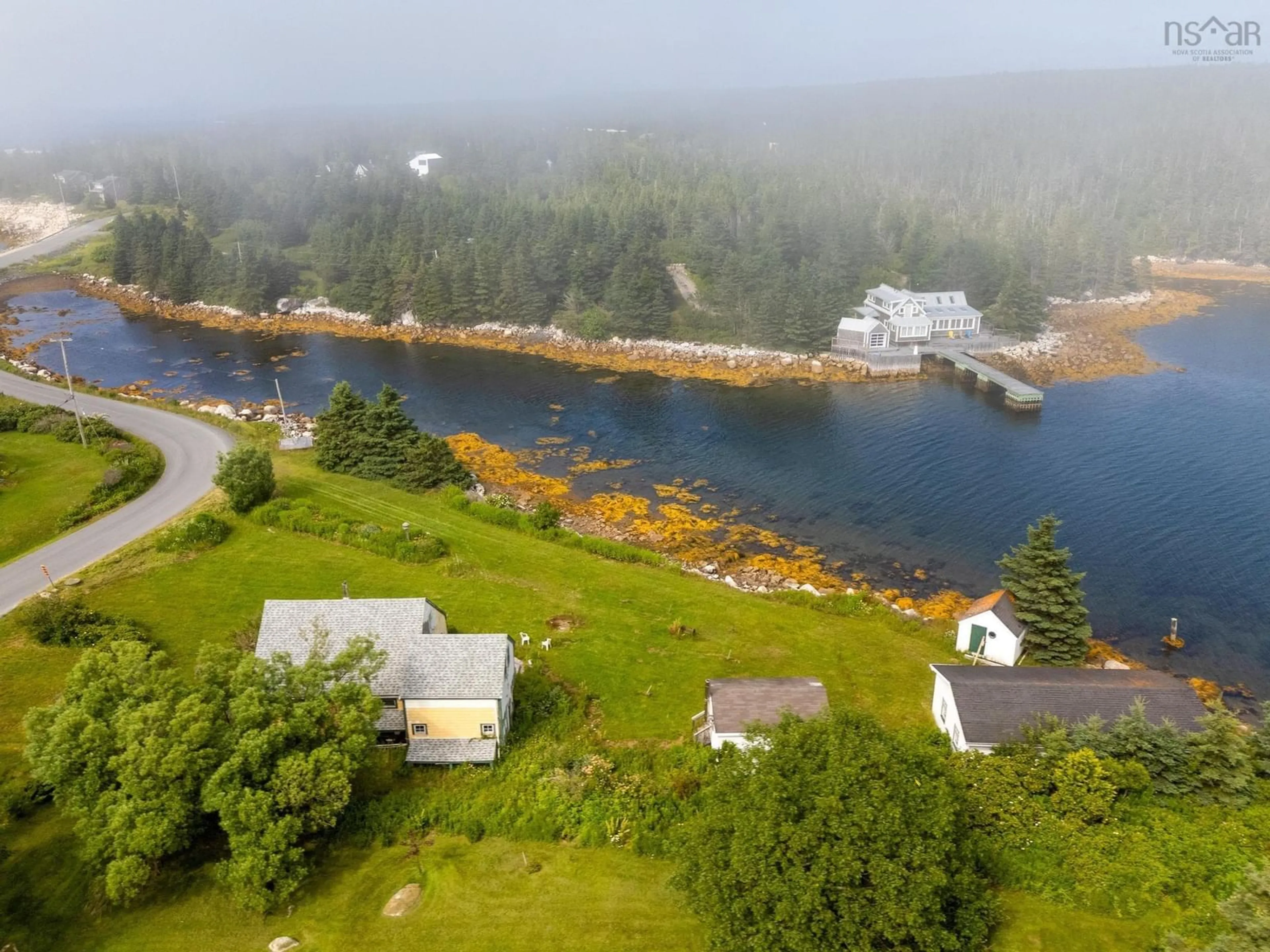 A pic from outside/outdoor area/front of a property/back of a property/a pic from drone, water/lake/river/ocean view for 194 Paddy's Head Road, Indian Harbour Nova Scotia B3Z 3N8