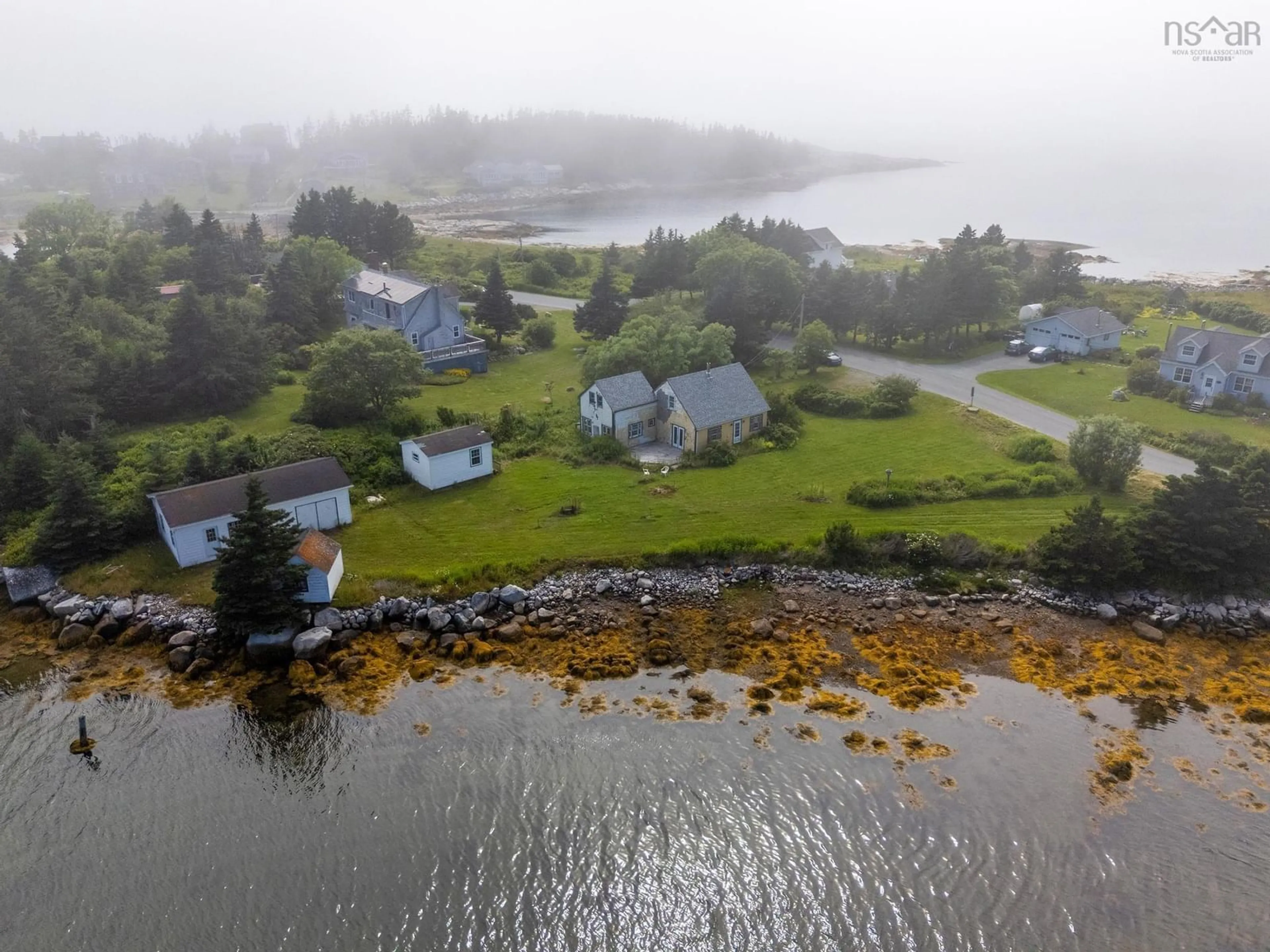 A pic from outside/outdoor area/front of a property/back of a property/a pic from drone, water/lake/river/ocean view for 194 Paddy's Head Road, Indian Harbour Nova Scotia B3Z 3N8