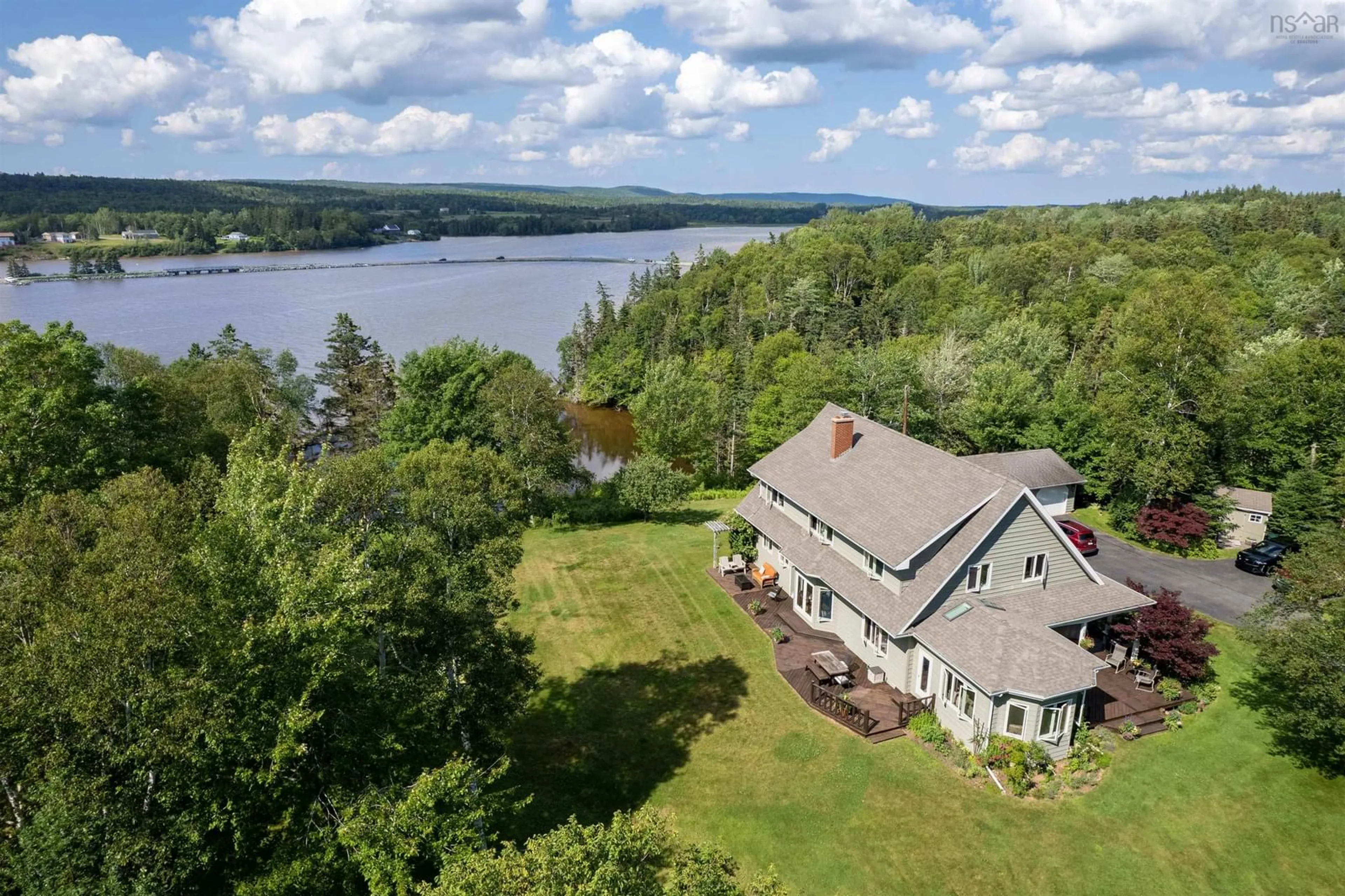 A pic from outside/outdoor area/front of a property/back of a property/a pic from drone, water/lake/river/ocean view for 70 Tweednooge Pl, East Bay Nova Scotia B1J 1M6