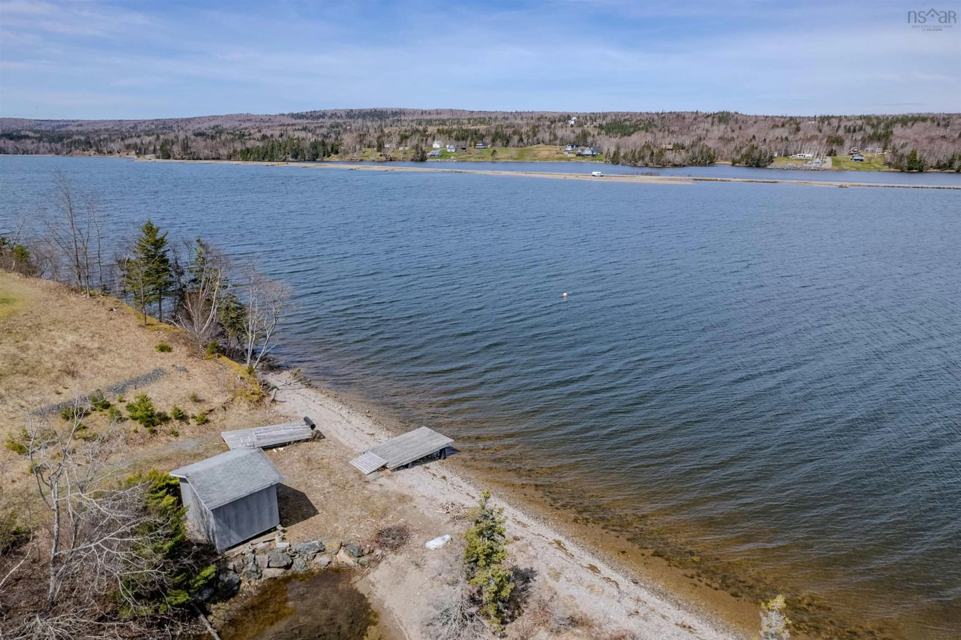 A pic from outside/outdoor area/front of a property/back of a property/a pic from drone, water/lake/river/ocean view for 70 Tweednooge Pl, East Bay Nova Scotia B1J 1M6