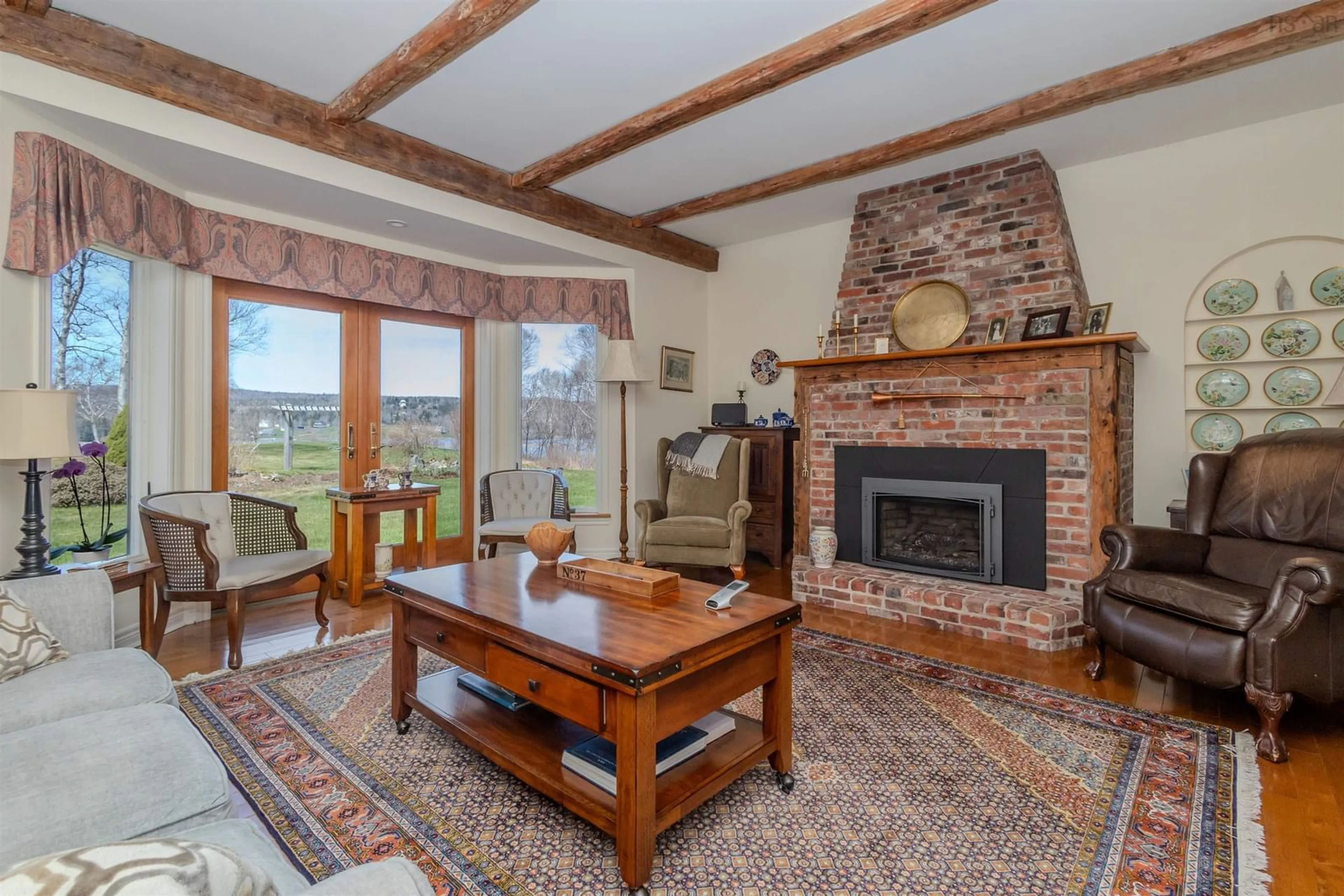 Living room with furniture, ceramic/tile floor for 70 Tweednooge Pl, East Bay Nova Scotia B1J 1M6
