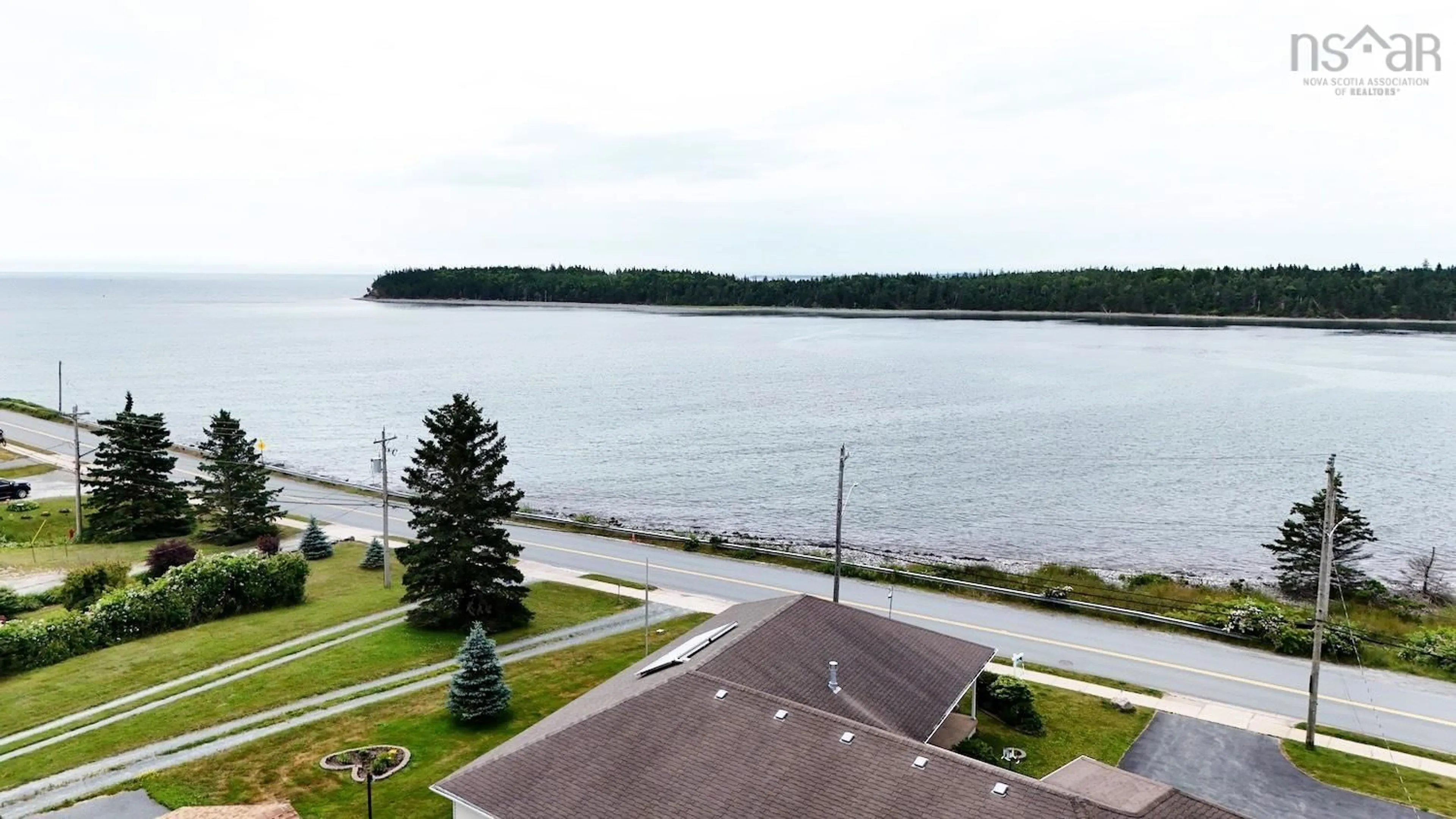 A pic from outside/outdoor area/front of a property/back of a property/a pic from drone, water/lake/river/ocean view for 1638 Shore Rd, Eastern Passage Nova Scotia B3G 1G3