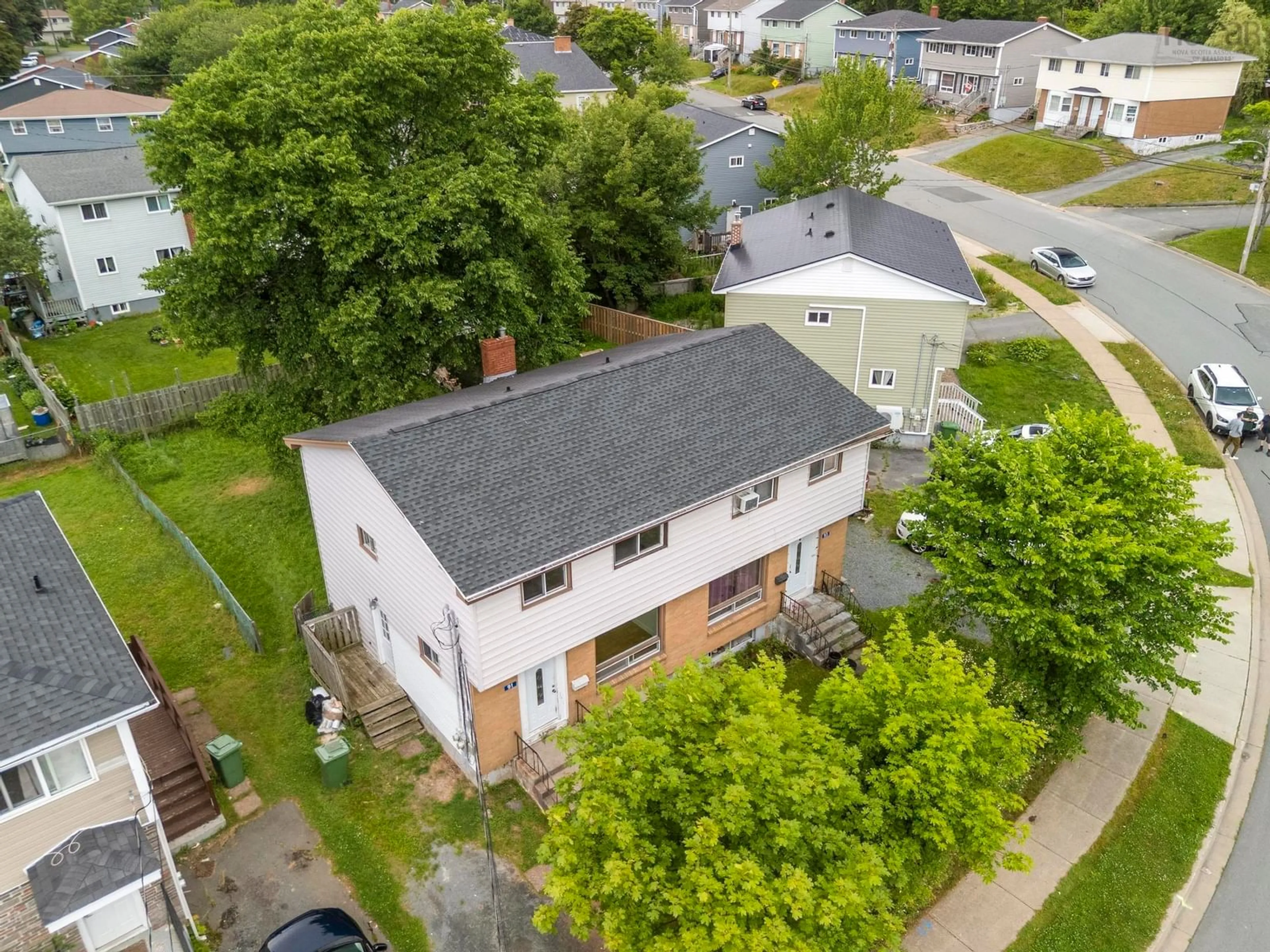 A pic from outside/outdoor area/front of a property/back of a property/a pic from drone, street for 91/93 Roleika Dr, Dartmouth Nova Scotia B2X 1M5