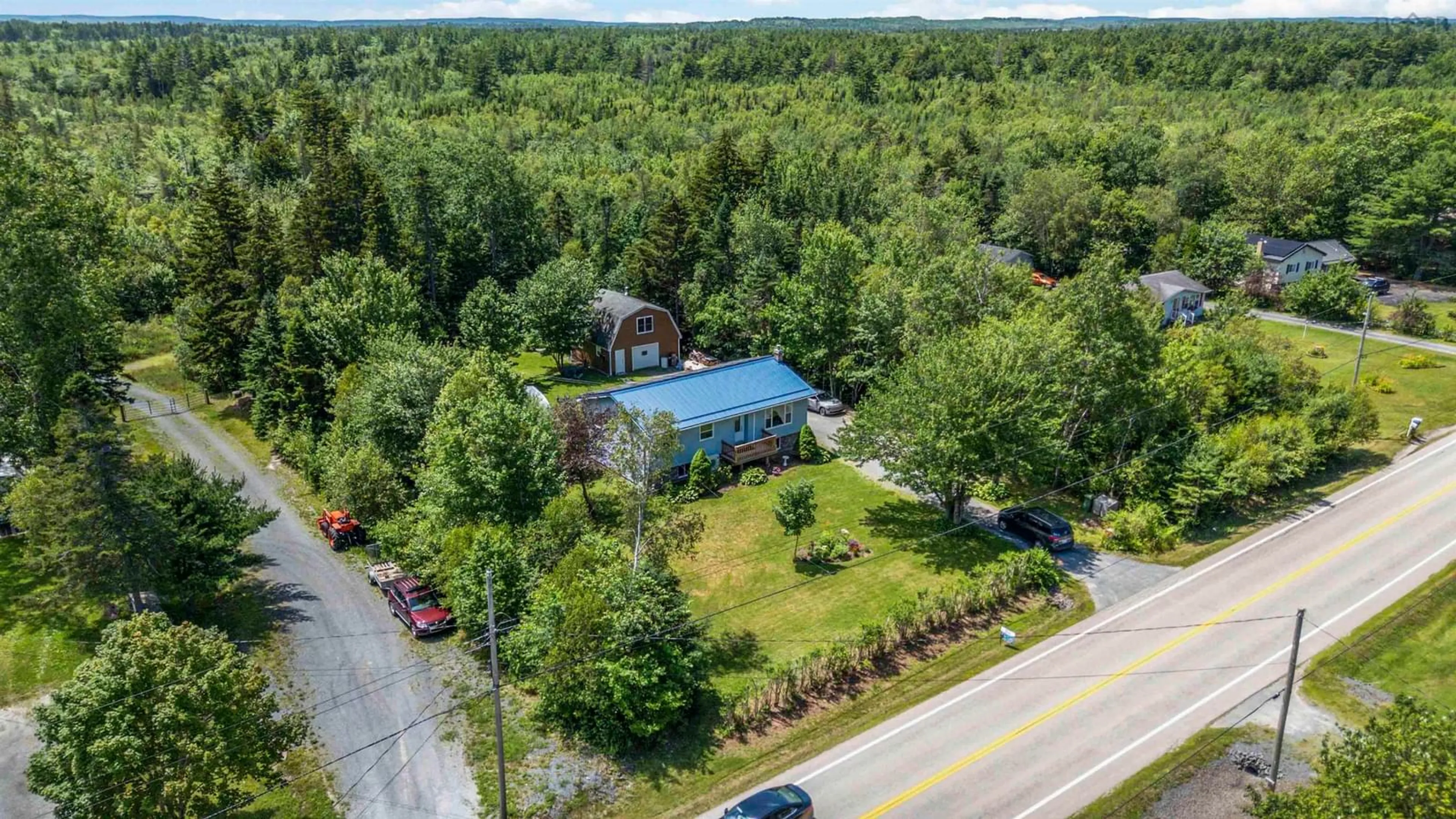 A pic from outside/outdoor area/front of a property/back of a property/a pic from drone, unknown for 11951 Highway 3, Spectacle Lakes Nova Scotia B0J 2C0