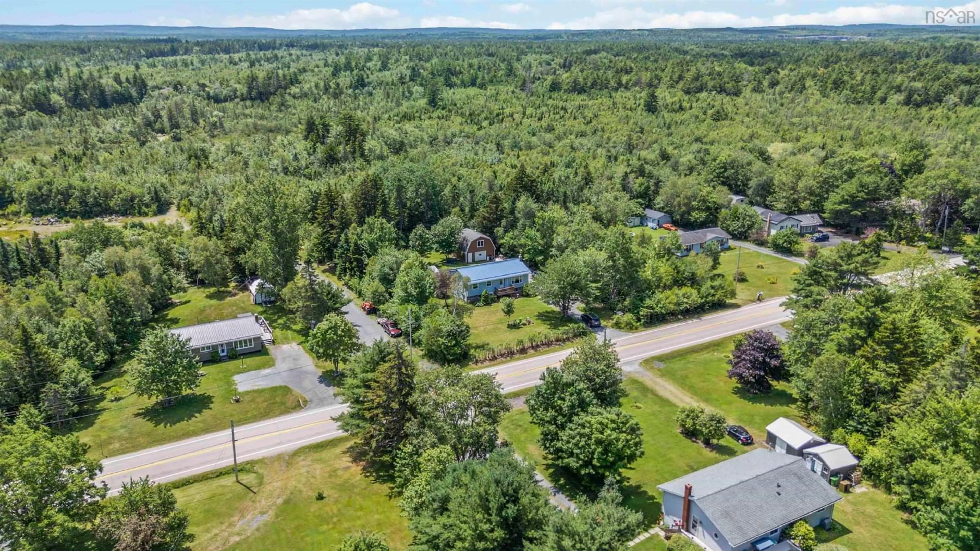 A pic from outside/outdoor area/front of a property/back of a property/a pic from drone, unknown for 11951 Highway 3, Spectacle Lakes Nova Scotia B0J 2C0
