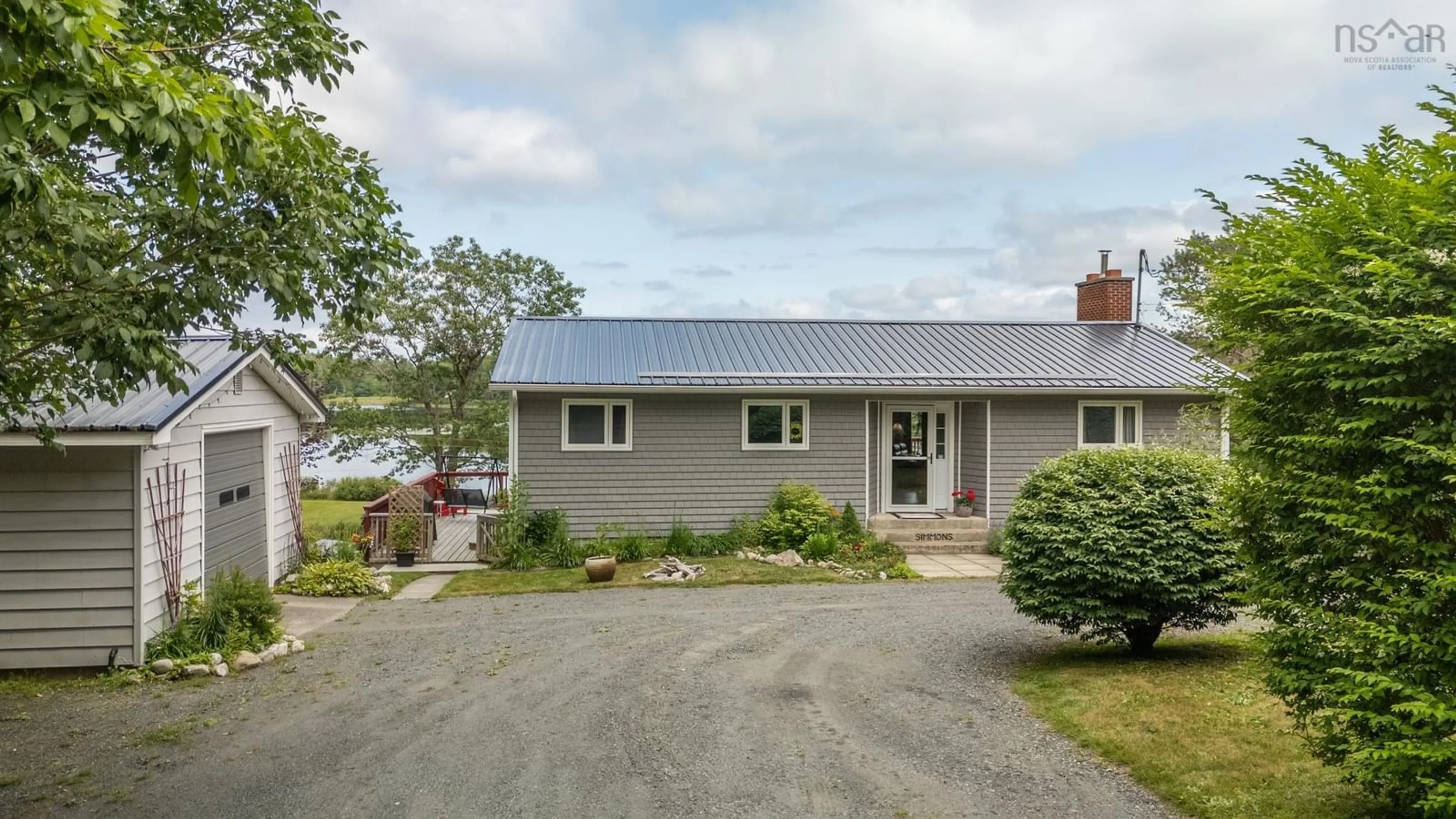 A pic from outside/outdoor area/front of a property/back of a property/a pic from drone, water/lake/river/ocean view for 998 Mood Rd, Summerville Nova Scotia B5A 5J5