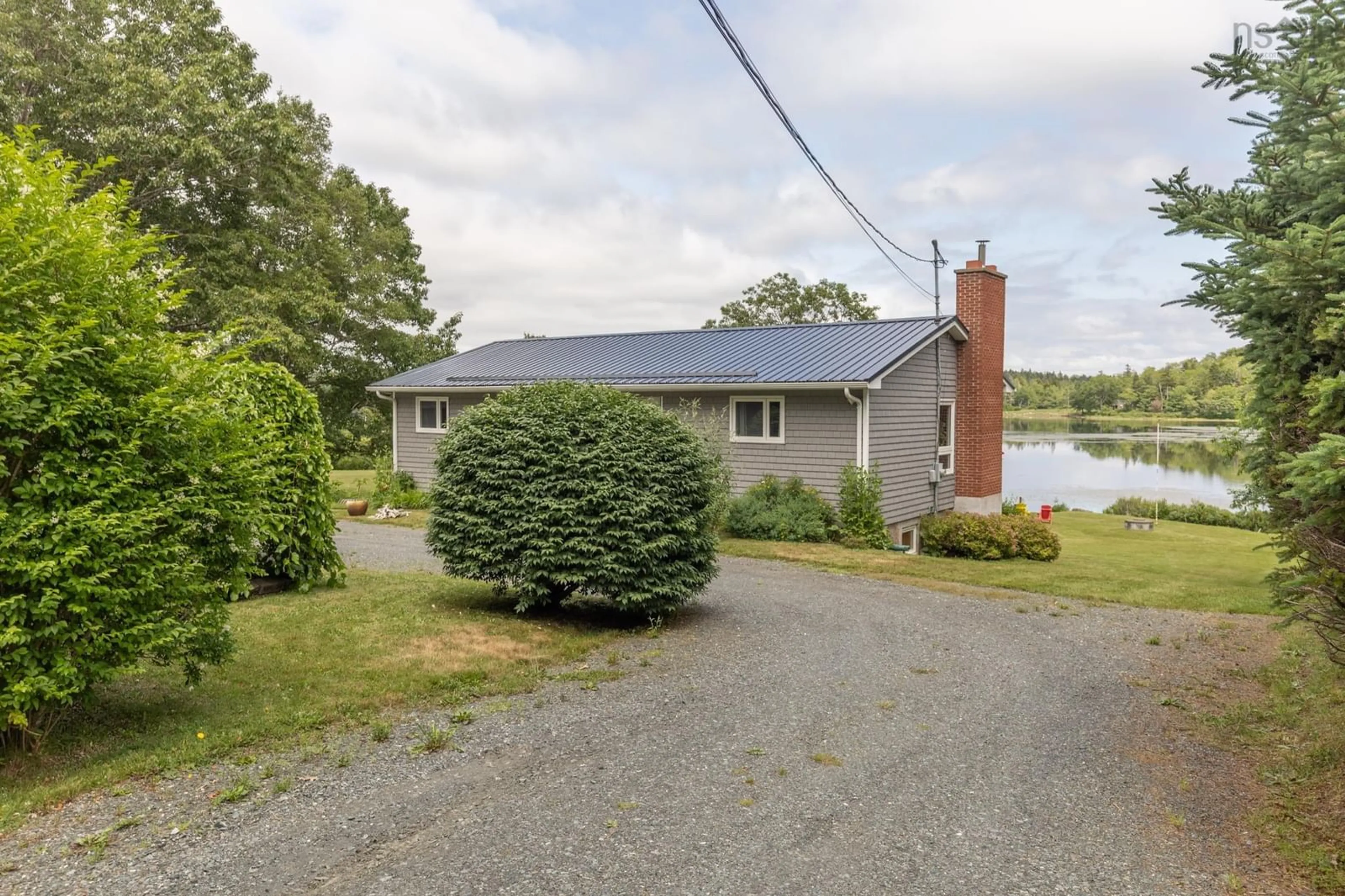 A pic from outside/outdoor area/front of a property/back of a property/a pic from drone, water/lake/river/ocean view for 998 Mood Rd, Summerville Nova Scotia B5A 5J5