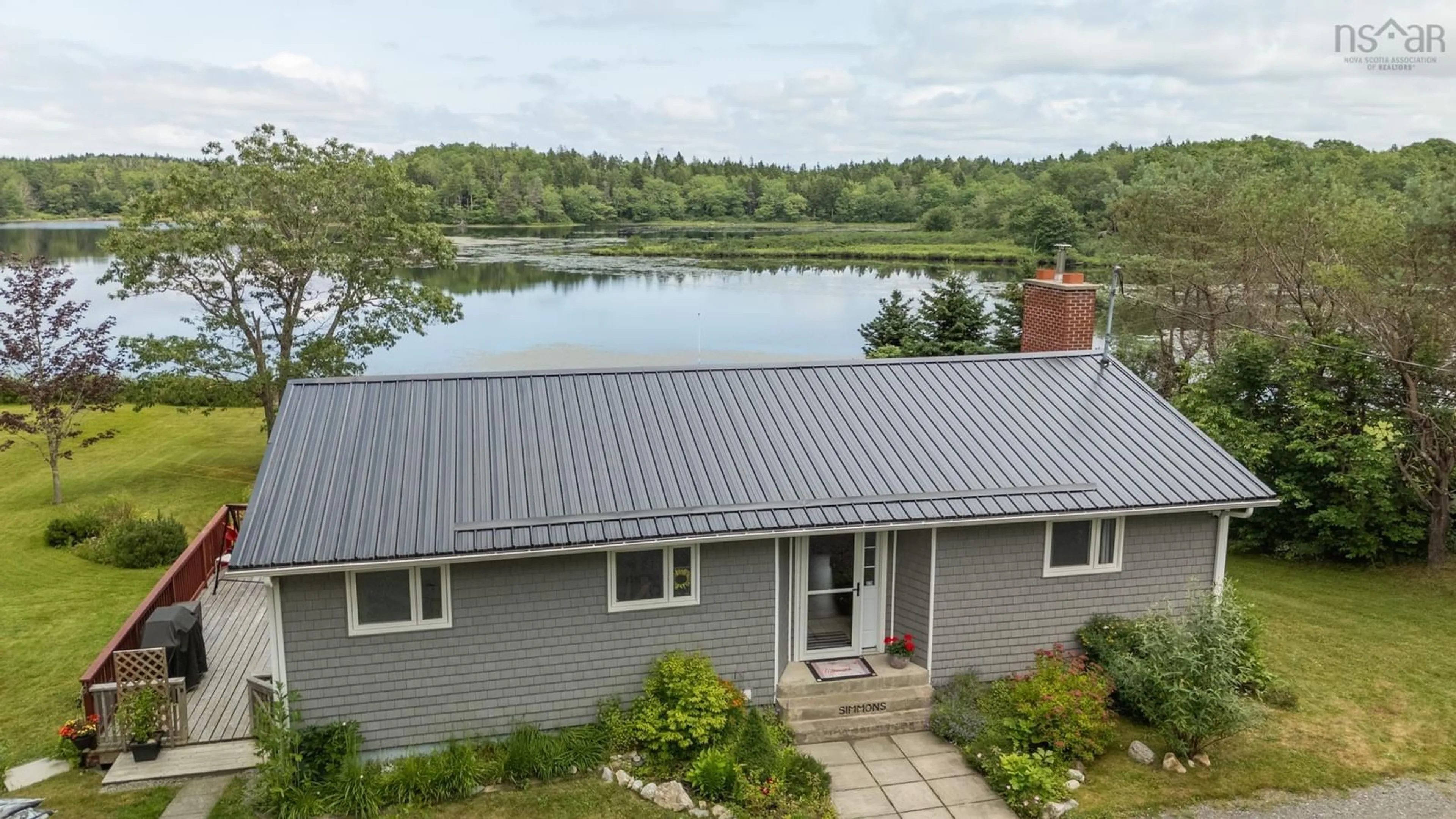 A pic from outside/outdoor area/front of a property/back of a property/a pic from drone, water/lake/river/ocean view for 998 Mood Rd, Summerville Nova Scotia B5A 5J5