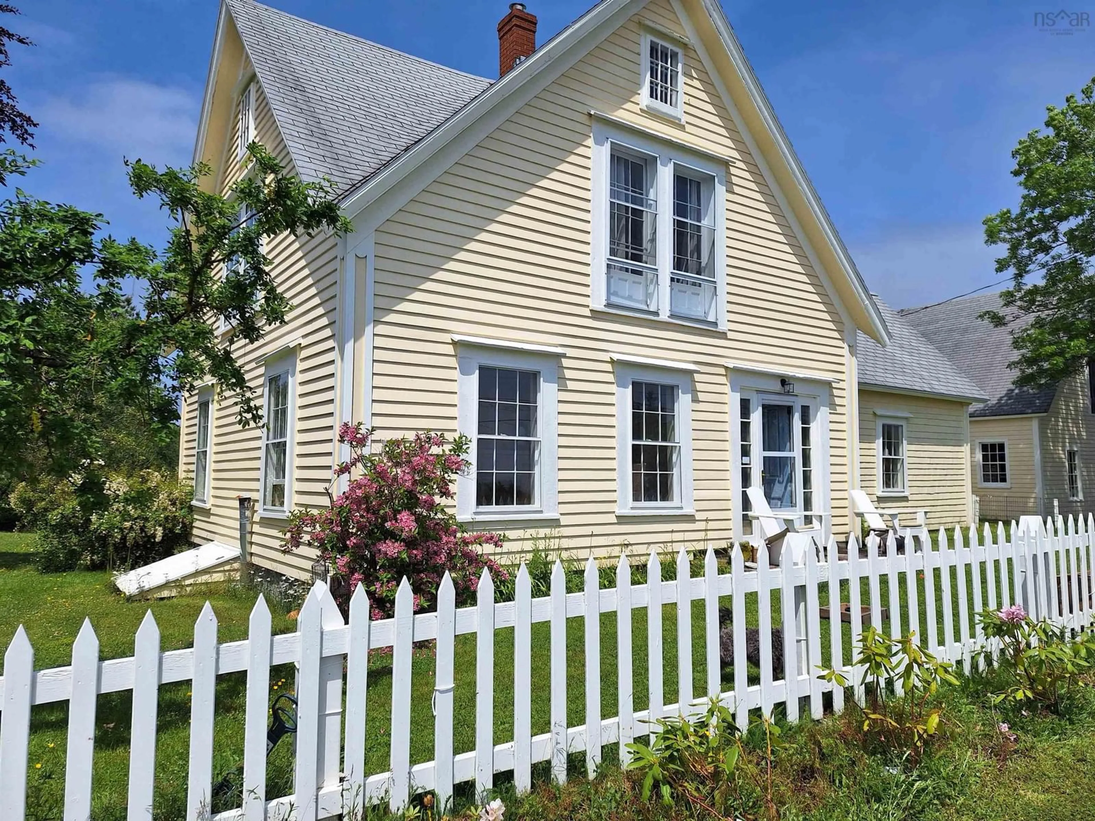 Home with vinyl exterior material, street for 5096 Shore Rd, North East Harbour Nova Scotia B0T 1W0