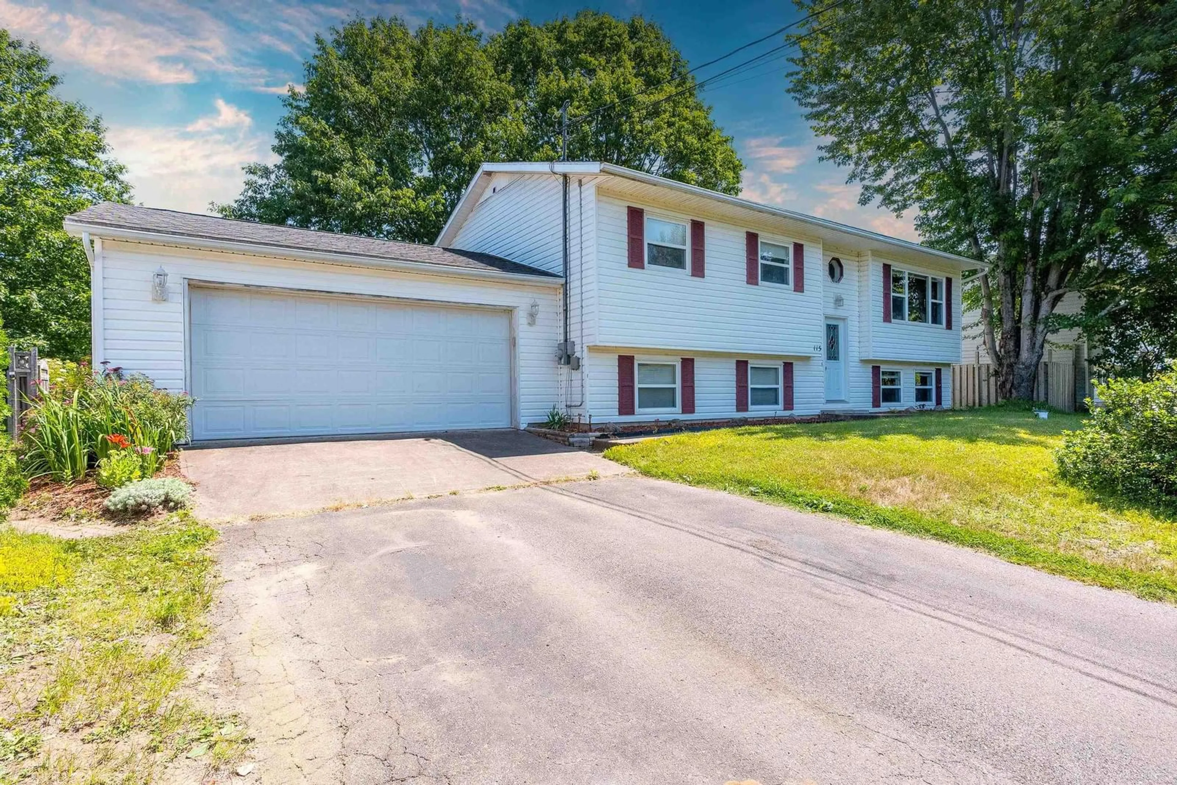 Home with vinyl exterior material, street for 115 Sunset Dr, Kingston Nova Scotia B0P 1R0