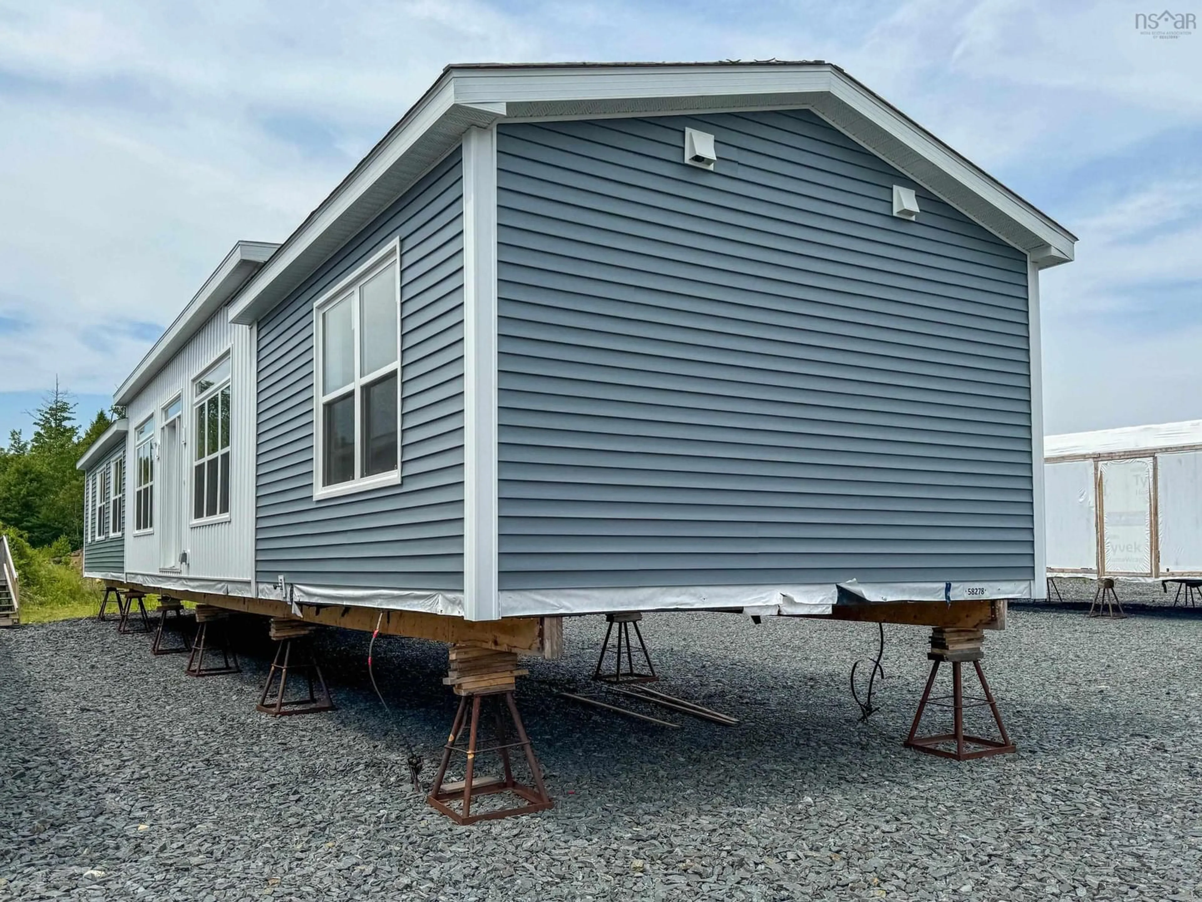 Home with vinyl exterior material, building for 12 Richards St, Bridgewater Nova Scotia B4V 4B3