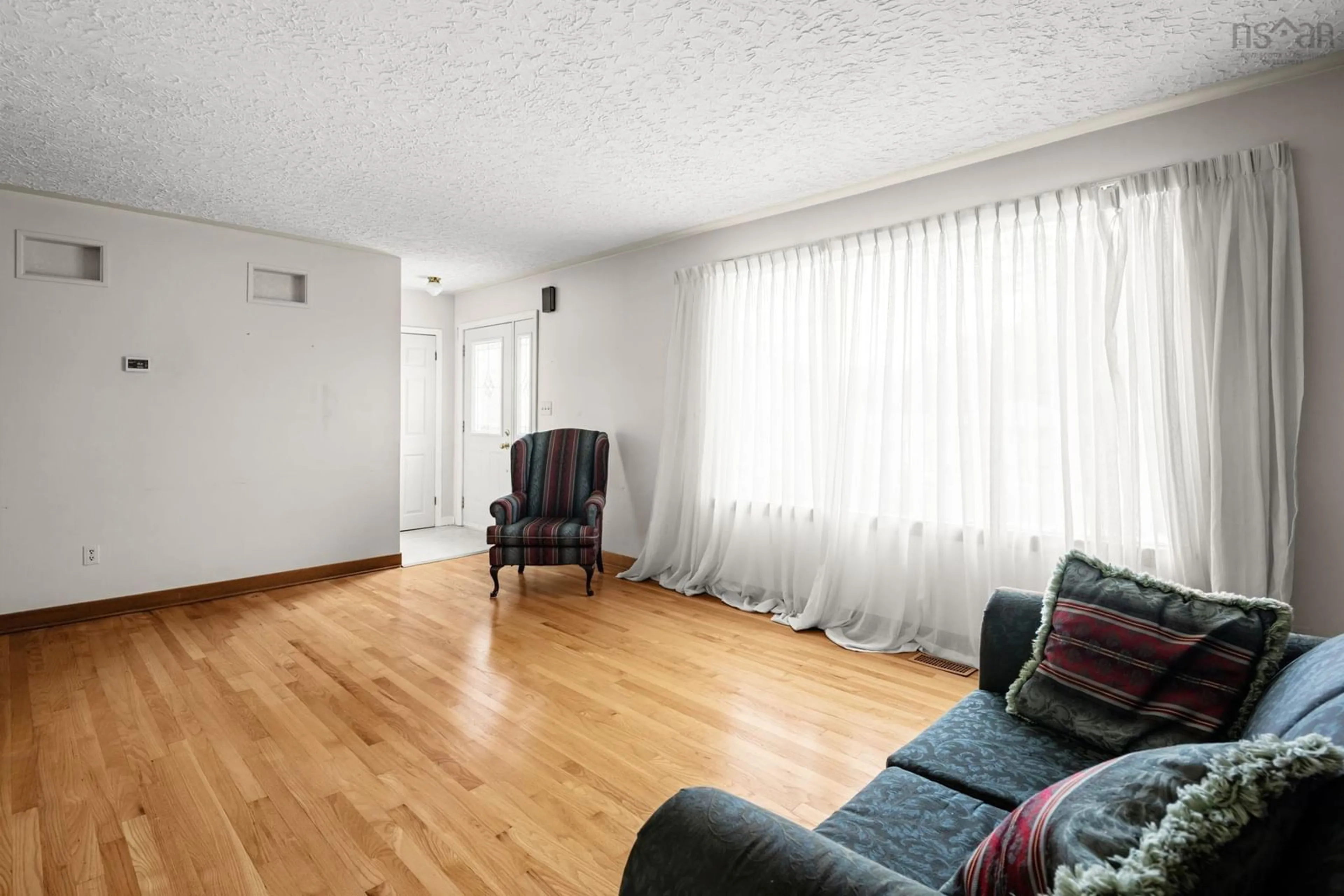 Living room with furniture, unknown for 25 White St, Dartmouth Nova Scotia B2X 2P6