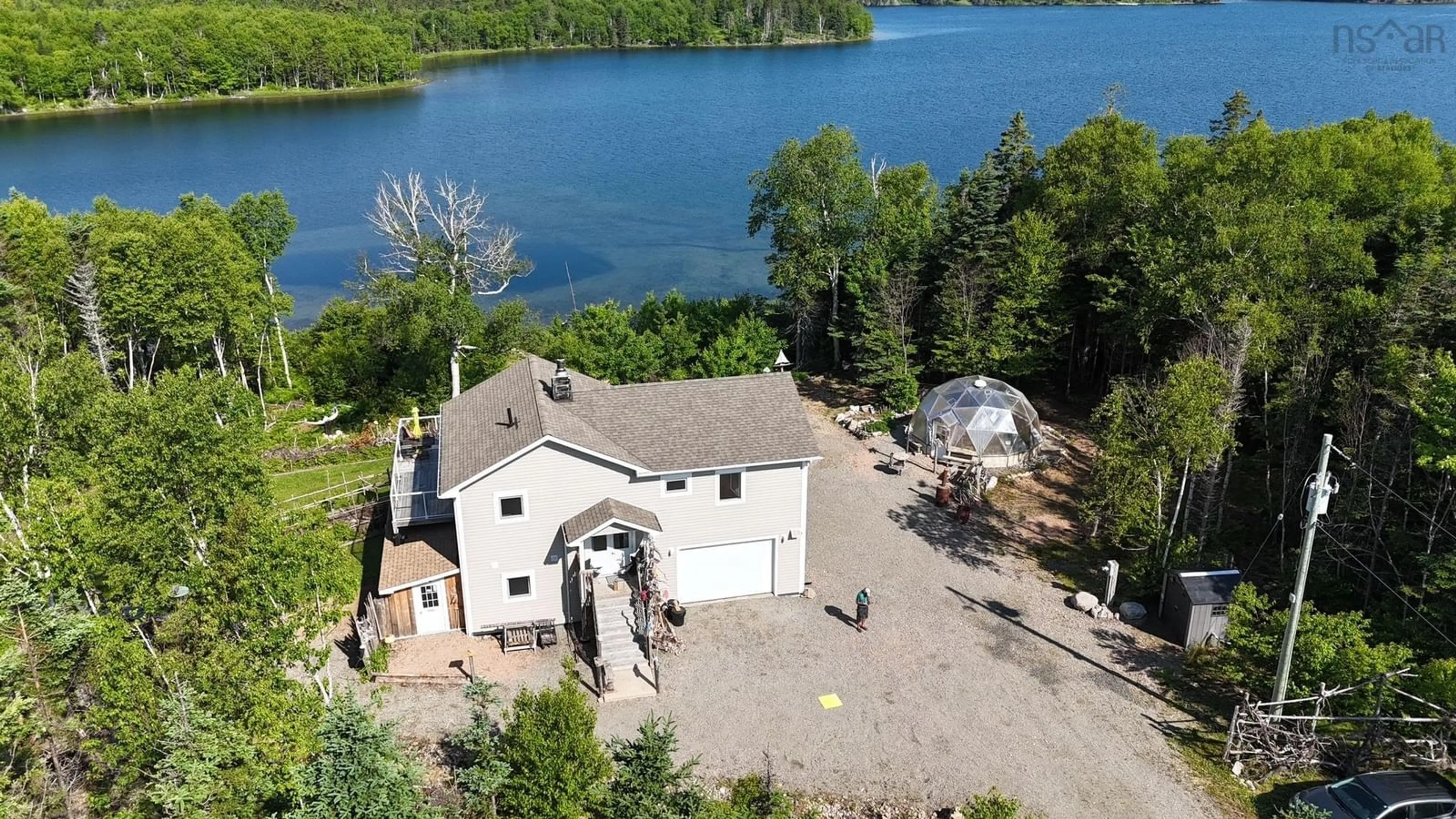 A pic from outside/outdoor area/front of a property/back of a property/a pic from drone, water/lake/river/ocean view for 284 Rodney Dr, Militia Point Nova Scotia B0E 2Y0