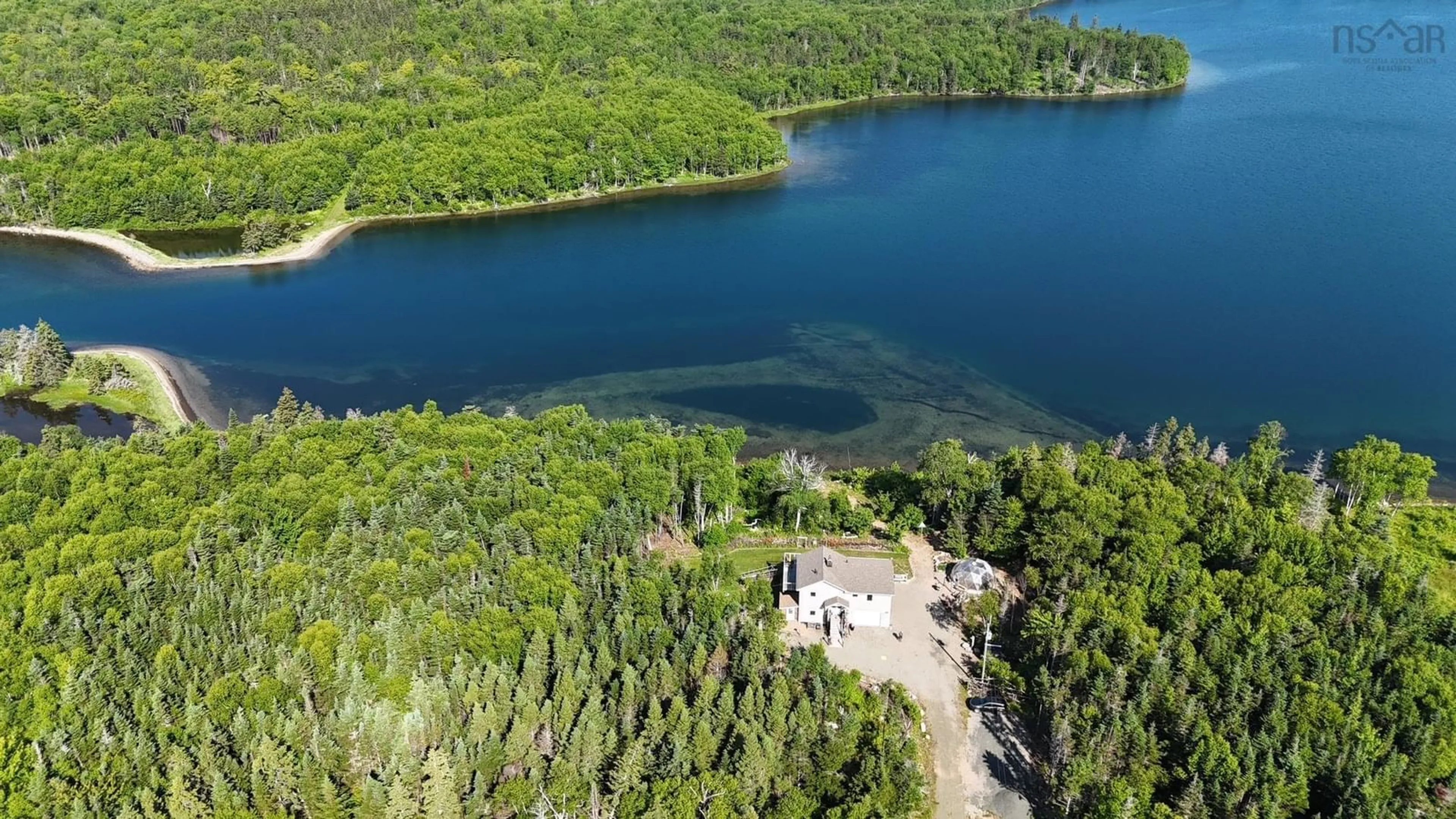 A pic from outside/outdoor area/front of a property/back of a property/a pic from drone, water/lake/river/ocean view for 284 Rodney Dr, Militia Point Nova Scotia B0E 2Y0