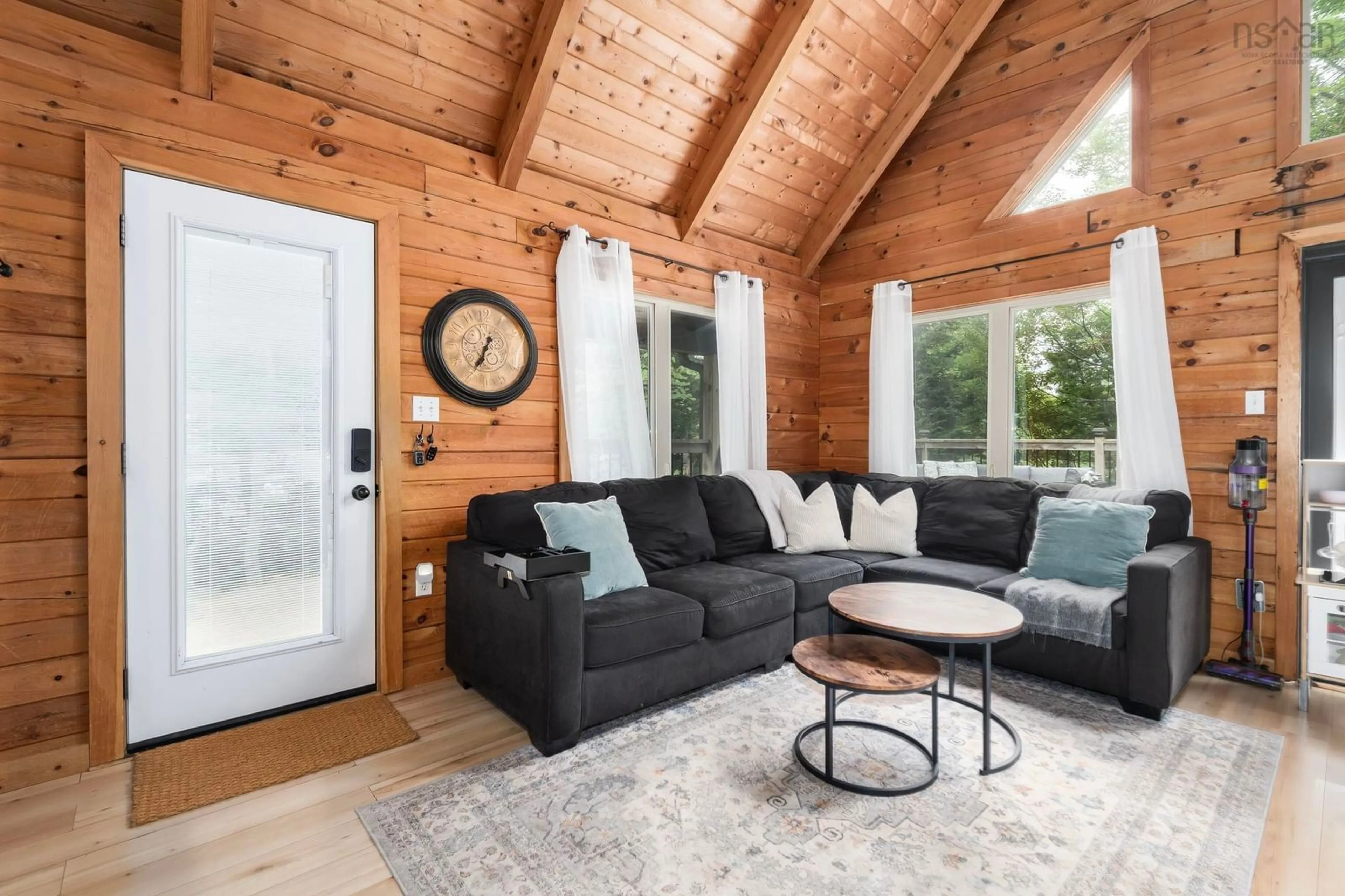 Living room with furniture, wood/laminate floor for 72 Mallard Dr, Hubley Nova Scotia B3Z 4L5
