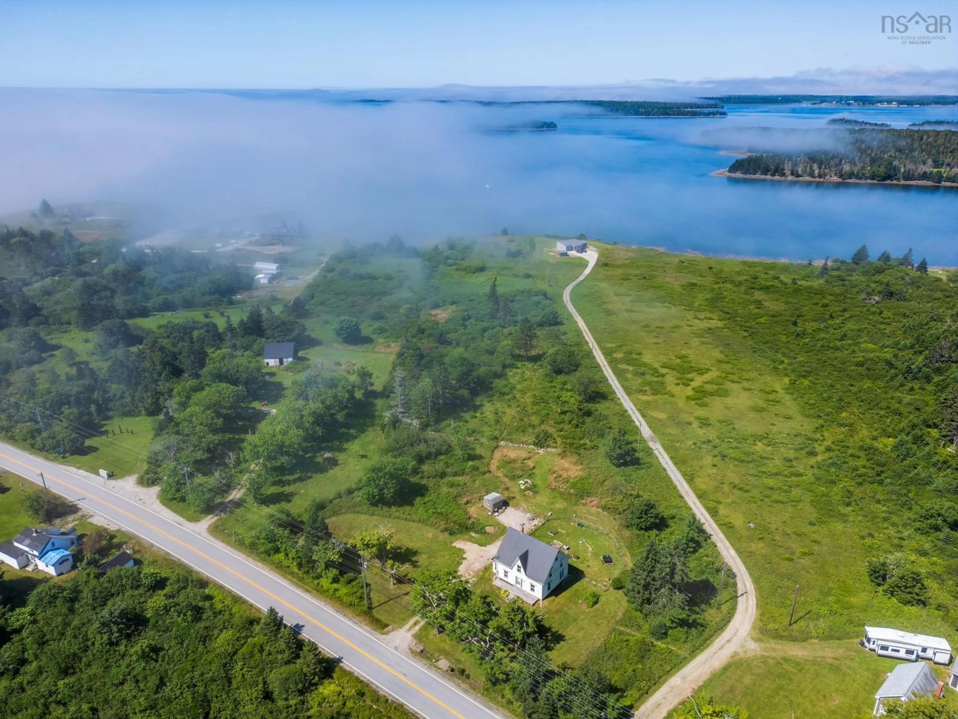 A pic from outside/outdoor area/front of a property/back of a property/a pic from drone, water/lake/river/ocean view for 4079 Highway 3, Lower Argyle Nova Scotia B0W 1W0