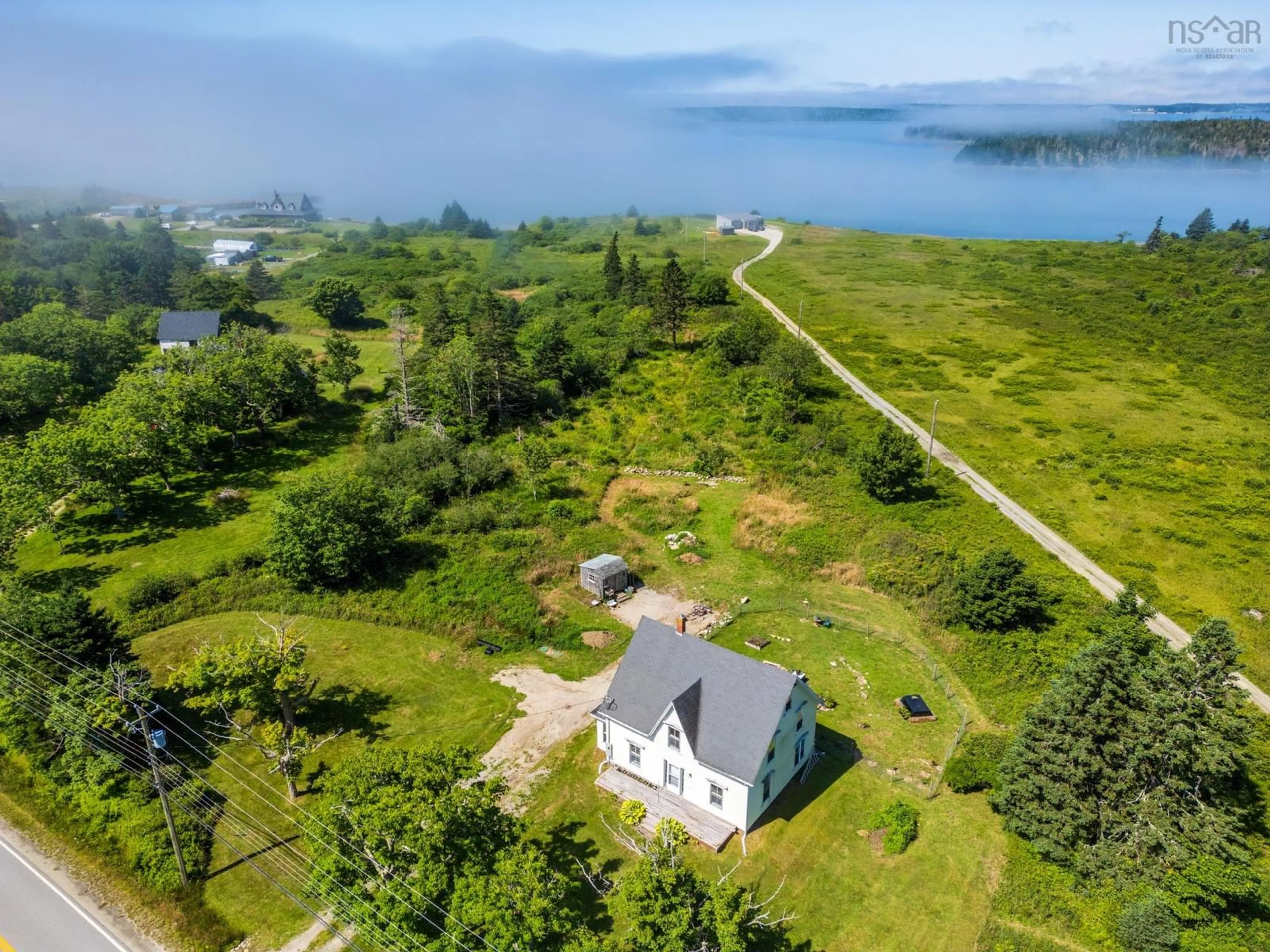 A pic from outside/outdoor area/front of a property/back of a property/a pic from drone, water/lake/river/ocean view for 4079 Highway 3, Lower Argyle Nova Scotia B0W 1W0