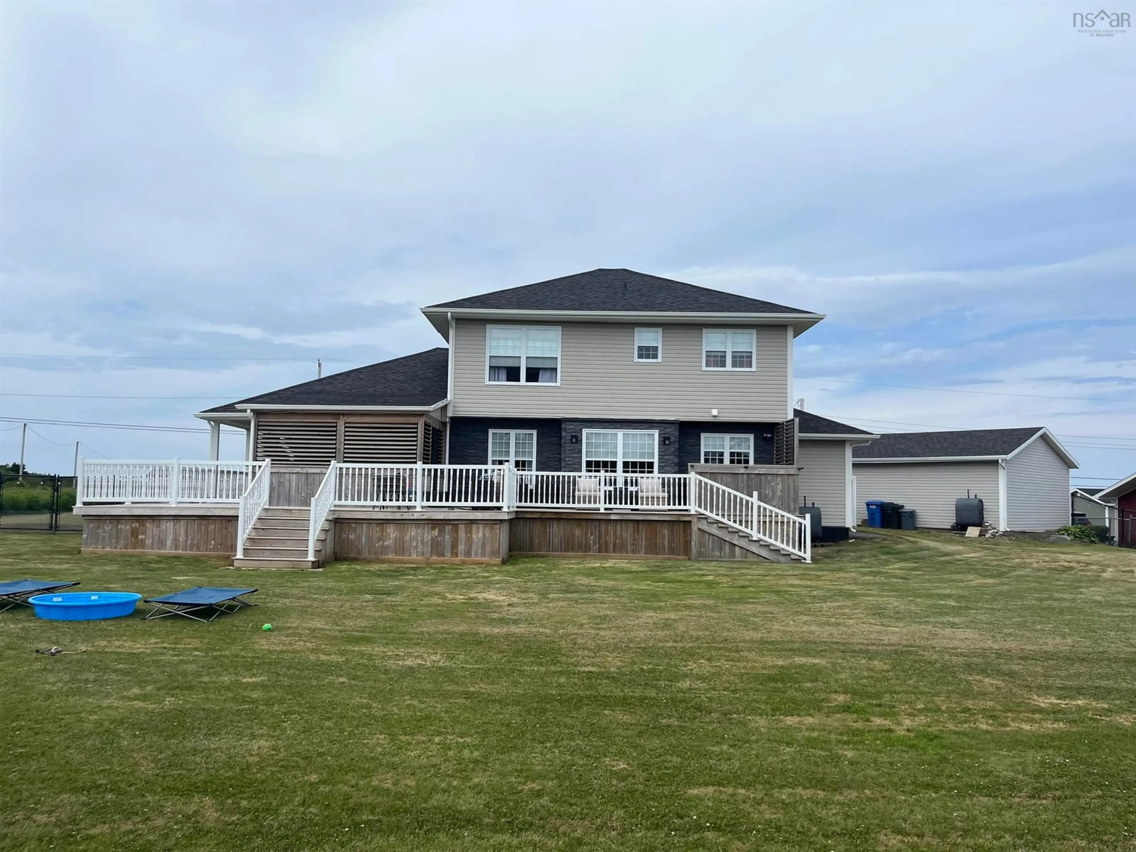 A pic from outside/outdoor area/front of a property/back of a property/a pic from drone, water/lake/river/ocean view for 21 Woodward St, Glace Bay Nova Scotia B1A 4R4