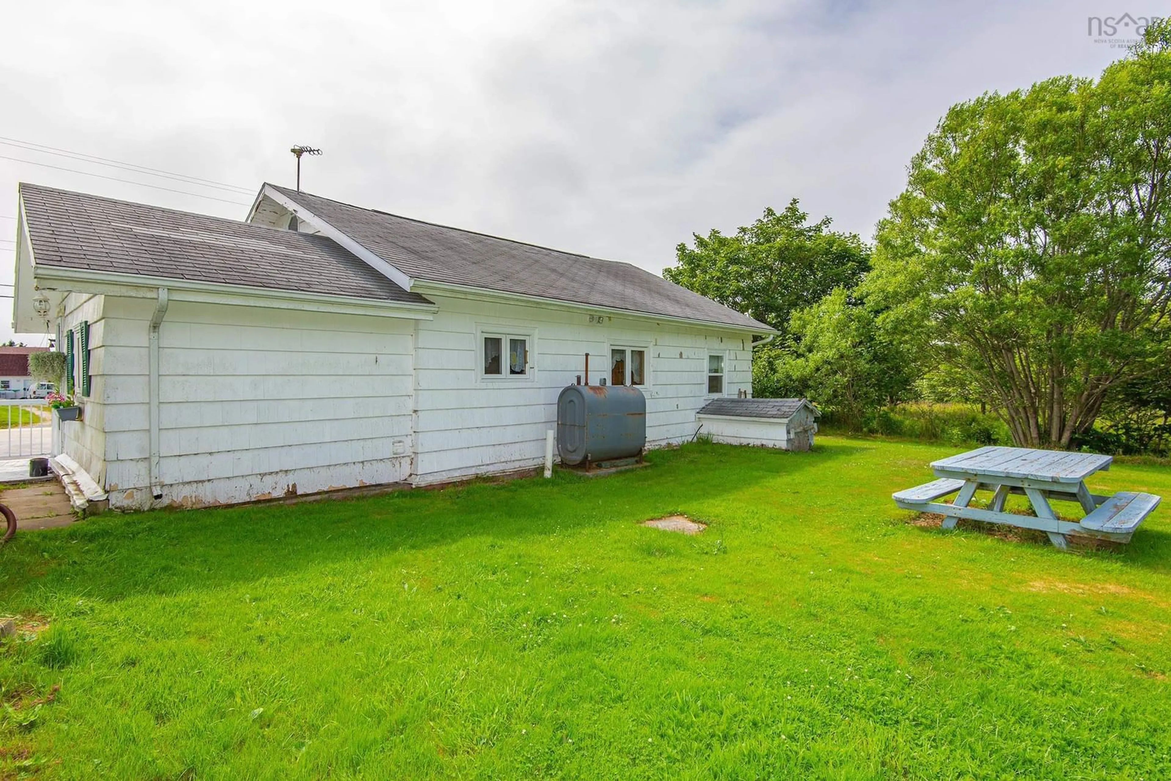 A pic from outside/outdoor area/front of a property/back of a property/a pic from drone, water/lake/river/ocean view for 362 Wyman Rd, Sand Beach Nova Scotia B5A 5G4