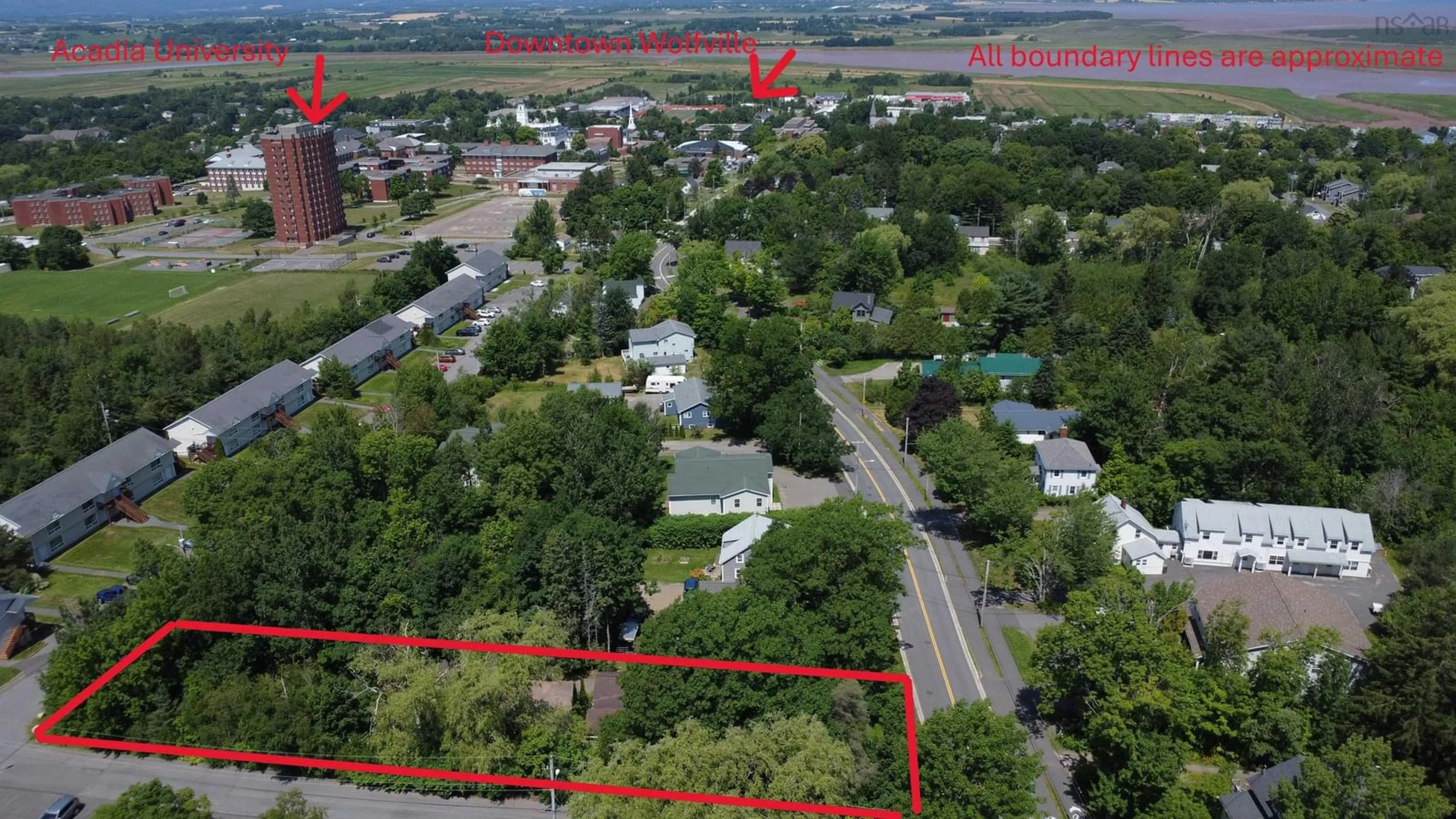 A pic from outside/outdoor area/front of a property/back of a property/a pic from drone, street for 90 Highland Ave, Wolfville Nova Scotia B4P 1Z6