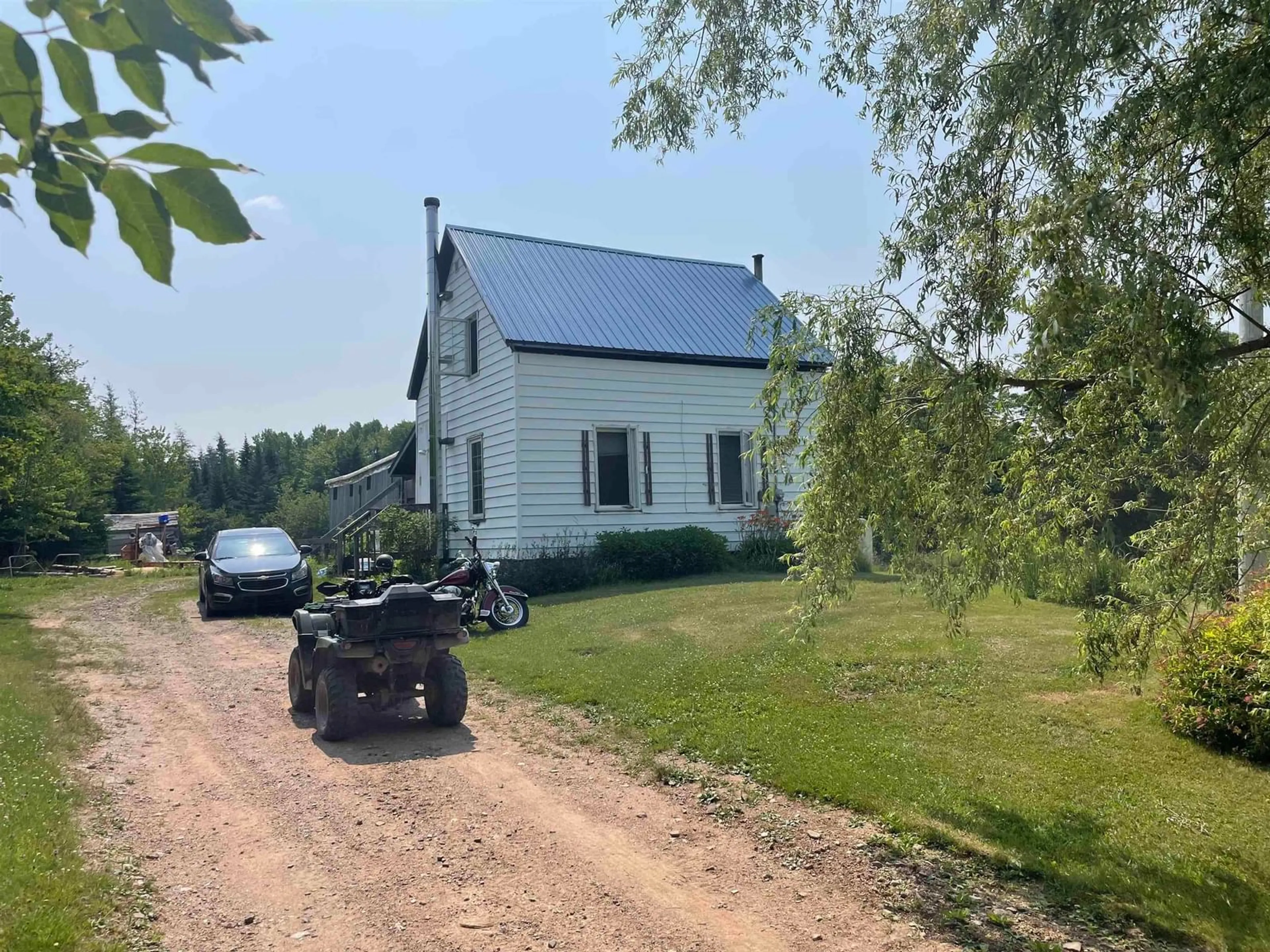 A pic from outside/outdoor area/front of a property/back of a property/a pic from drone, street for 2420 Marble Mountain Rd, West Bay Nova Scotia B0E 3K0