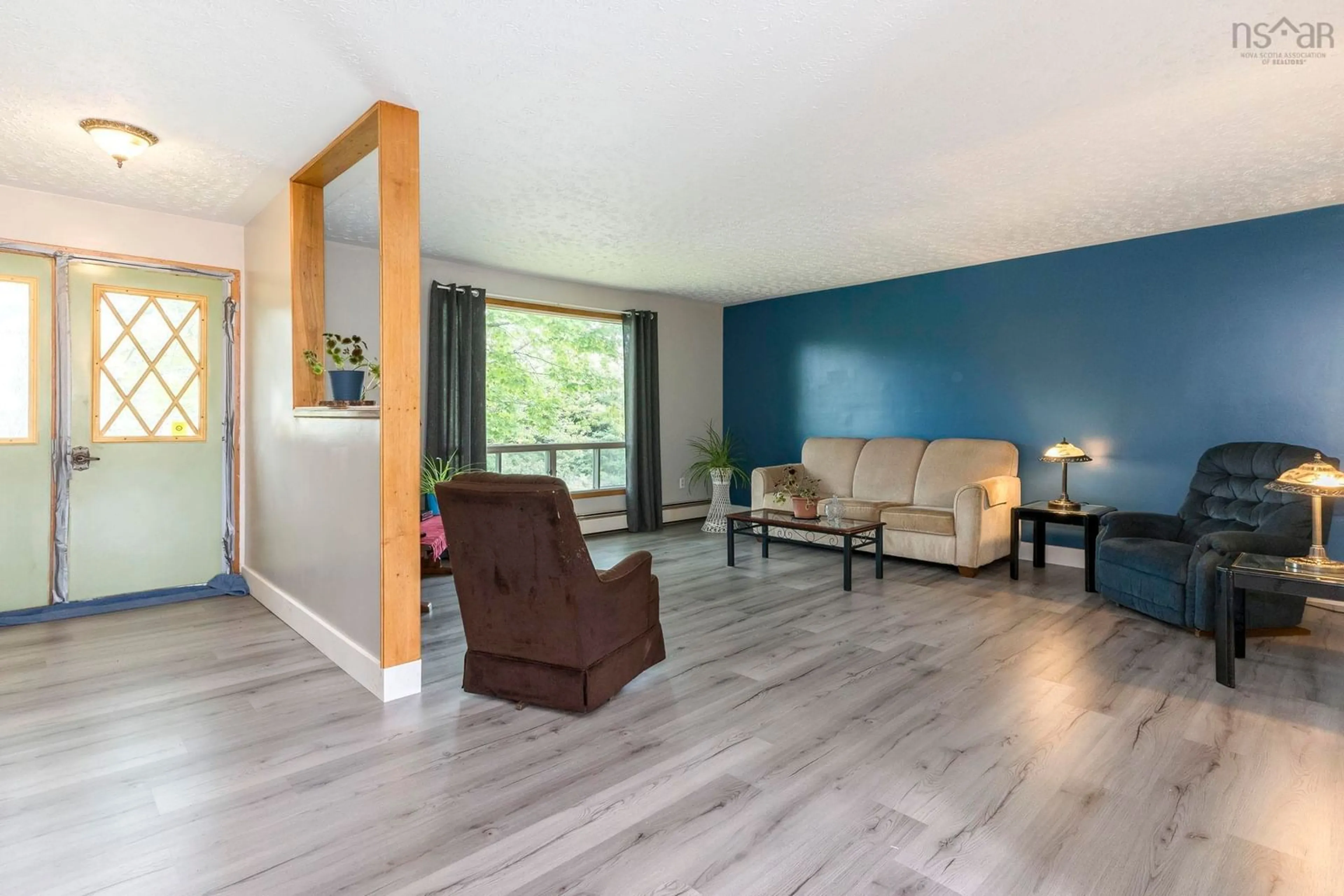 Living room with furniture, wood/laminate floor for 4 Melinda Ave, East Lawrencetown Nova Scotia B2Z 1N8
